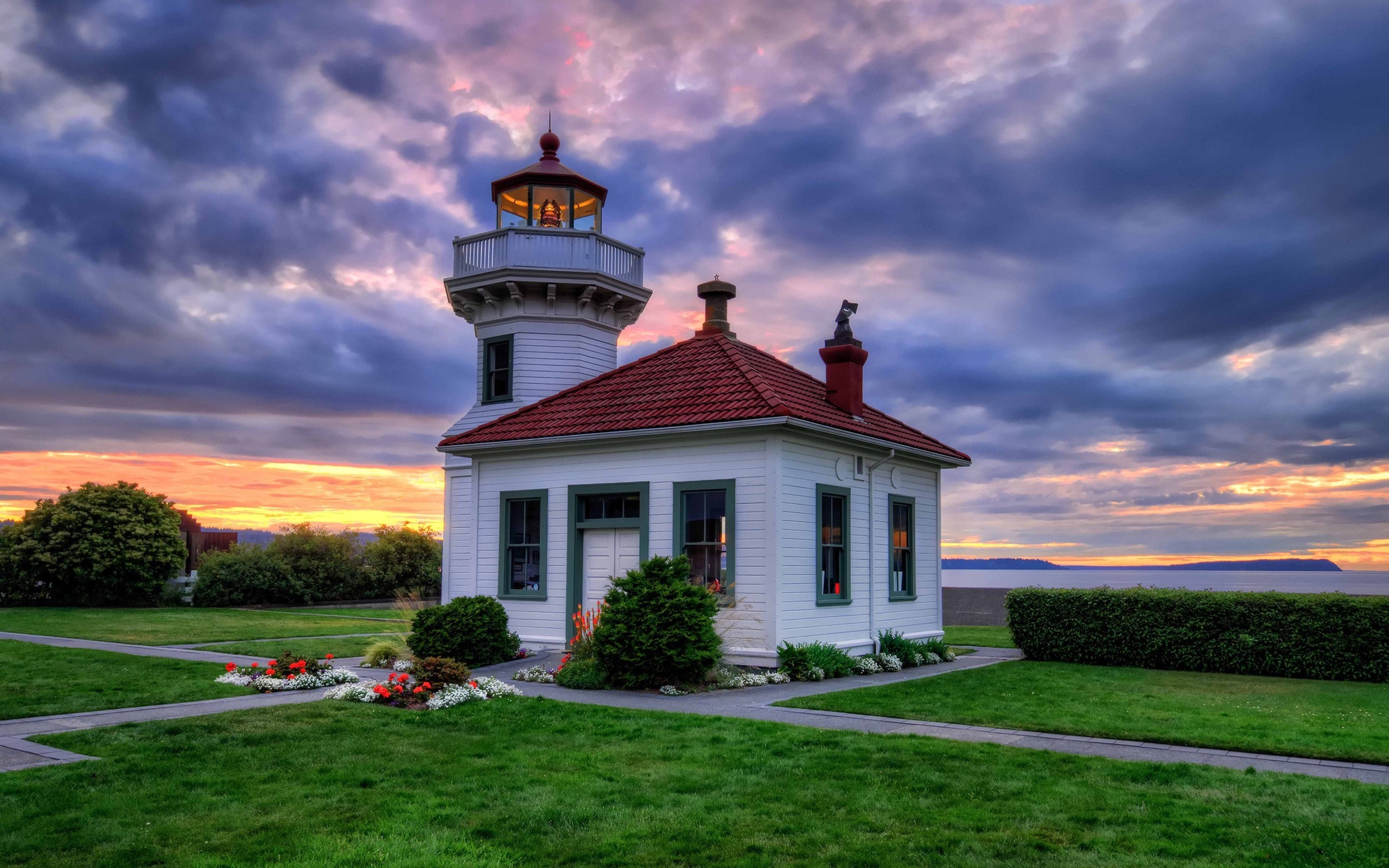 White lighthouse with red roof at sunset HD Wallpaper