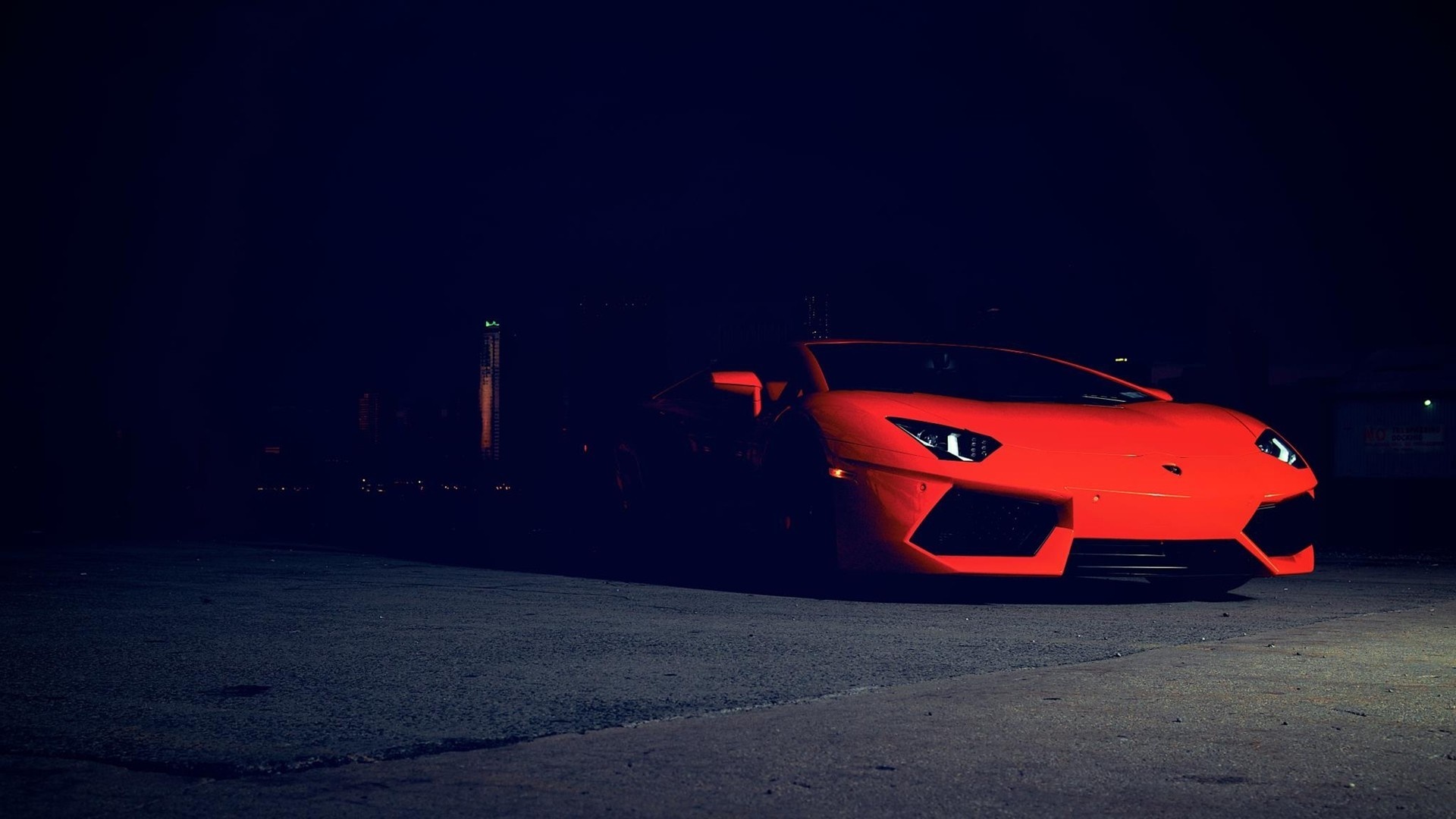 Orange Lamborghini Aventador parked at night HD Wallpaper