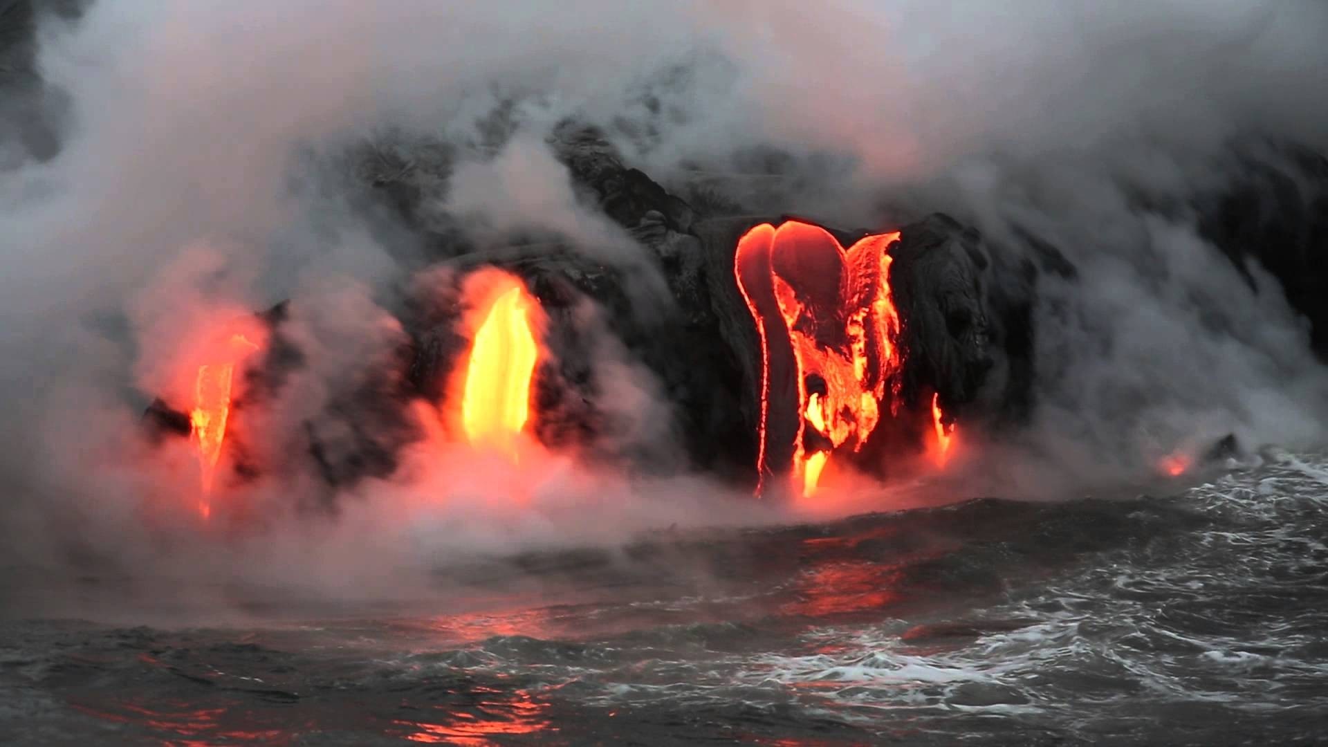 Lava flowing into the ocean in Hawaii HD Wallpaper