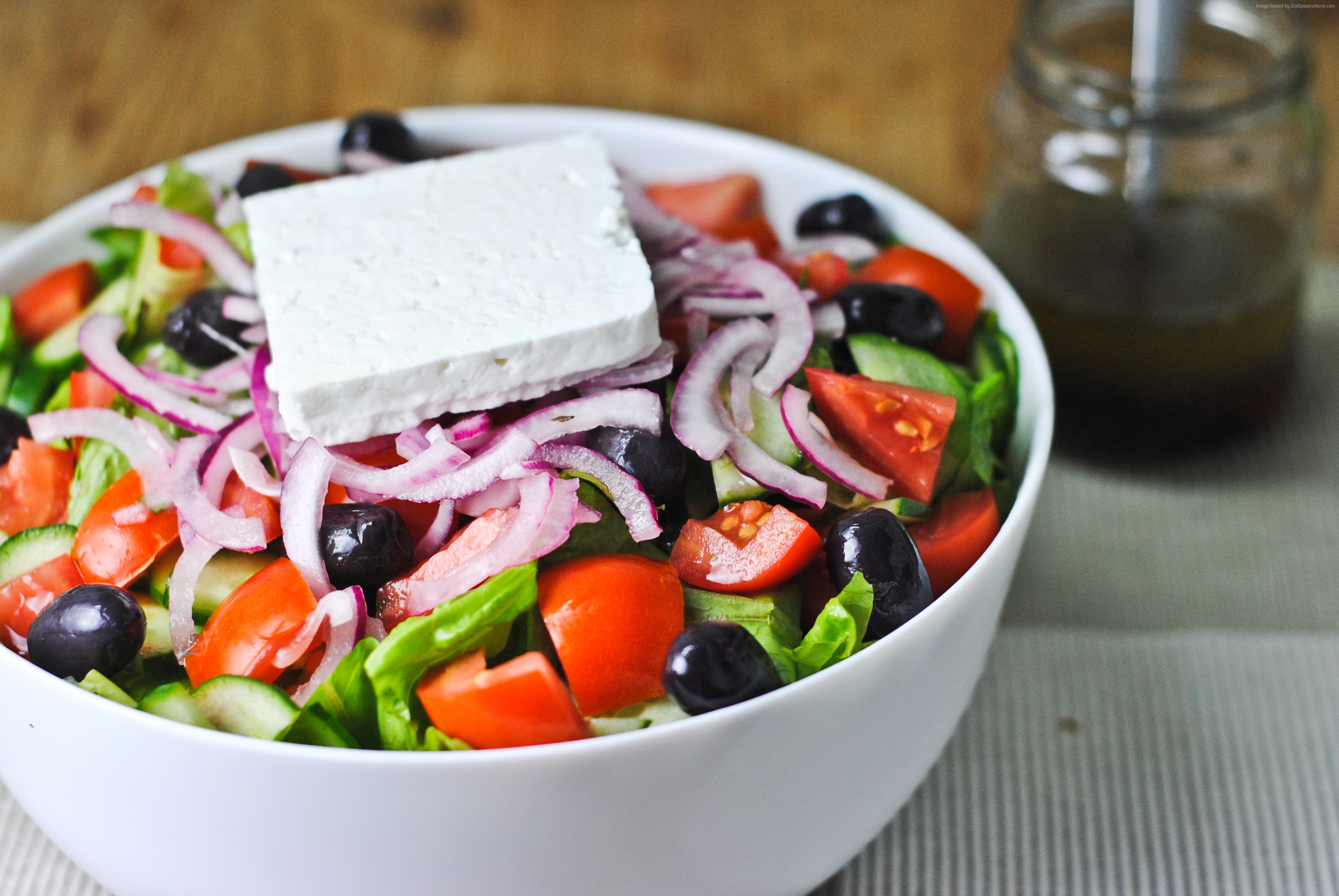 Greek salad with feta, olives, tomatoes, and cucumbers HD Wallpaper