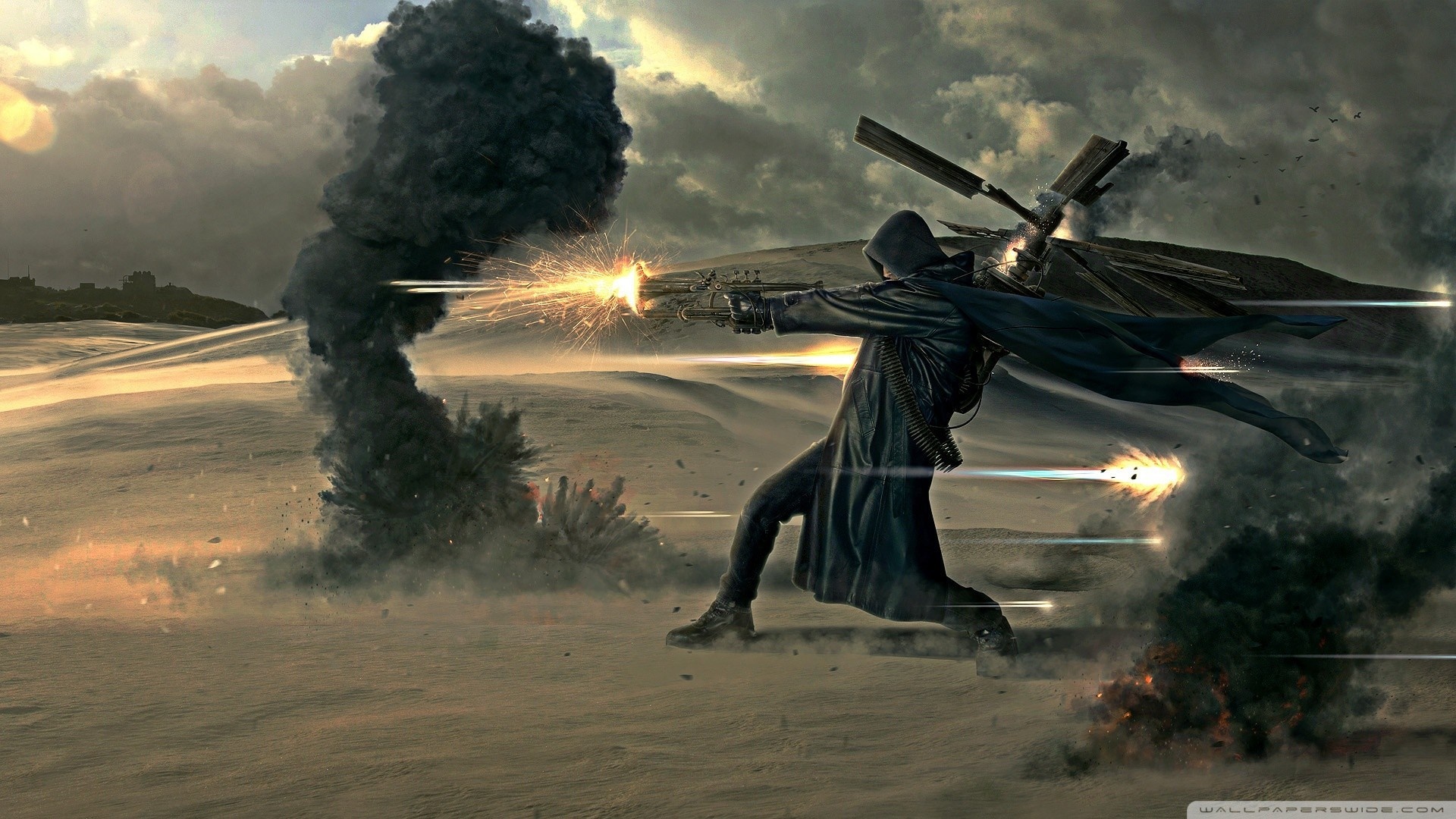 Man in black coat firing gun in desert with explosions HD Wallpaper