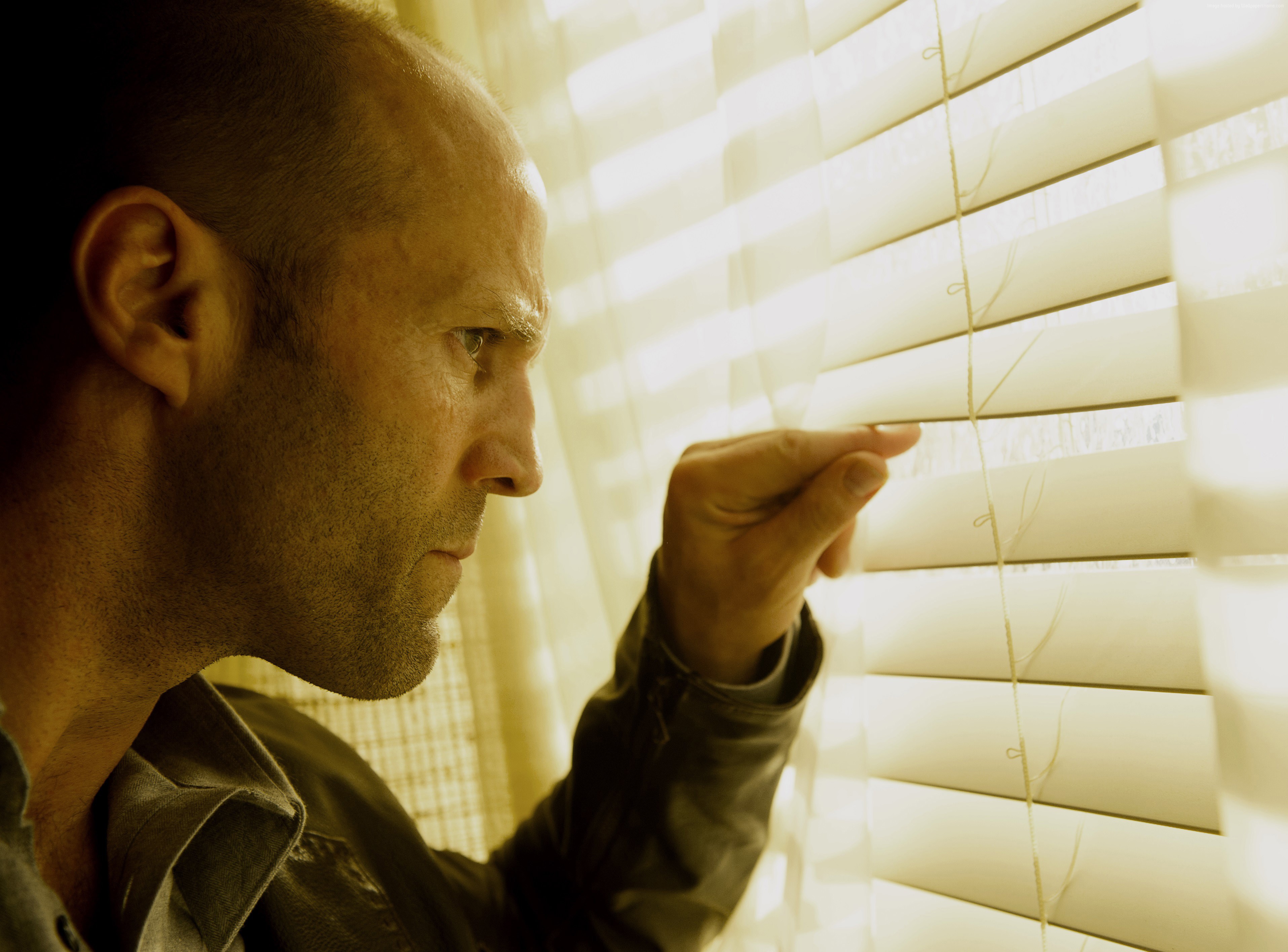 Jason Statham peeking through blinds HD Wallpaper