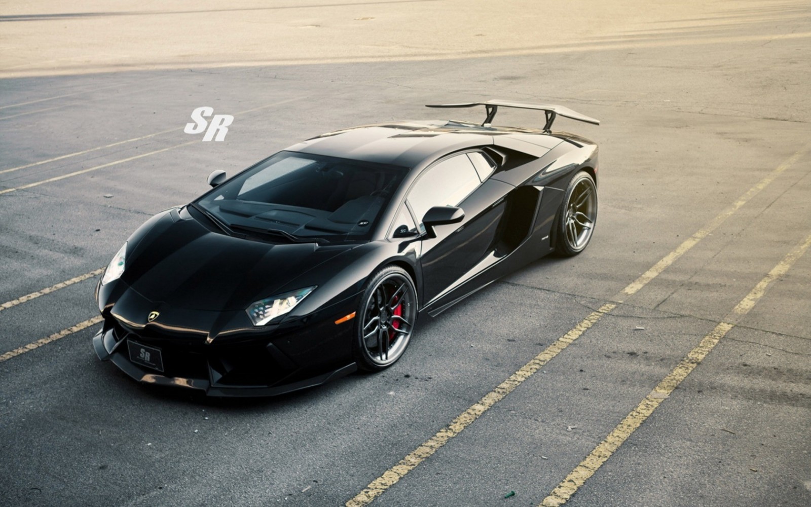 Black Lamborghini Aventador SVJ parked on asphalt HD Wallpaper