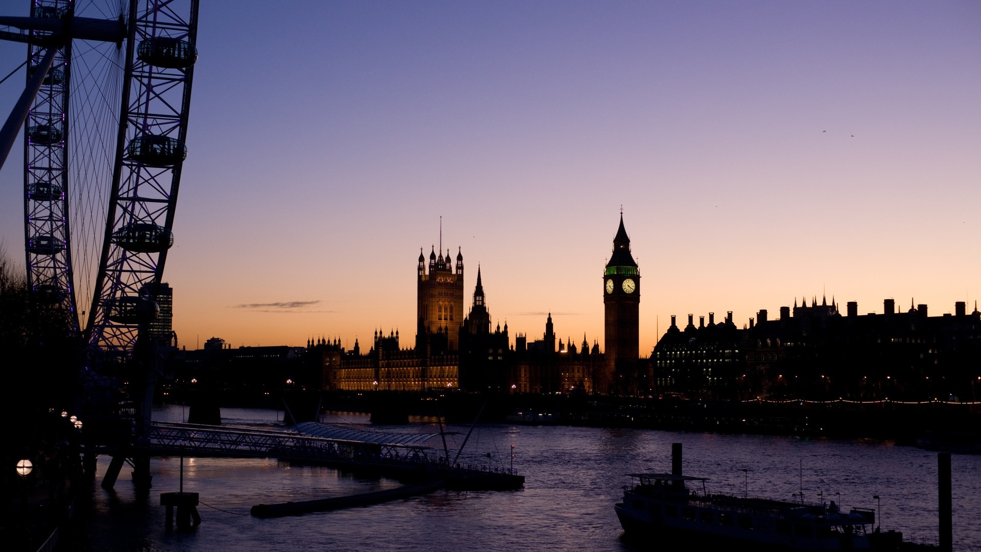 London skyline with the London Eye and Houses of Parliament at dusk HD Wallpaper