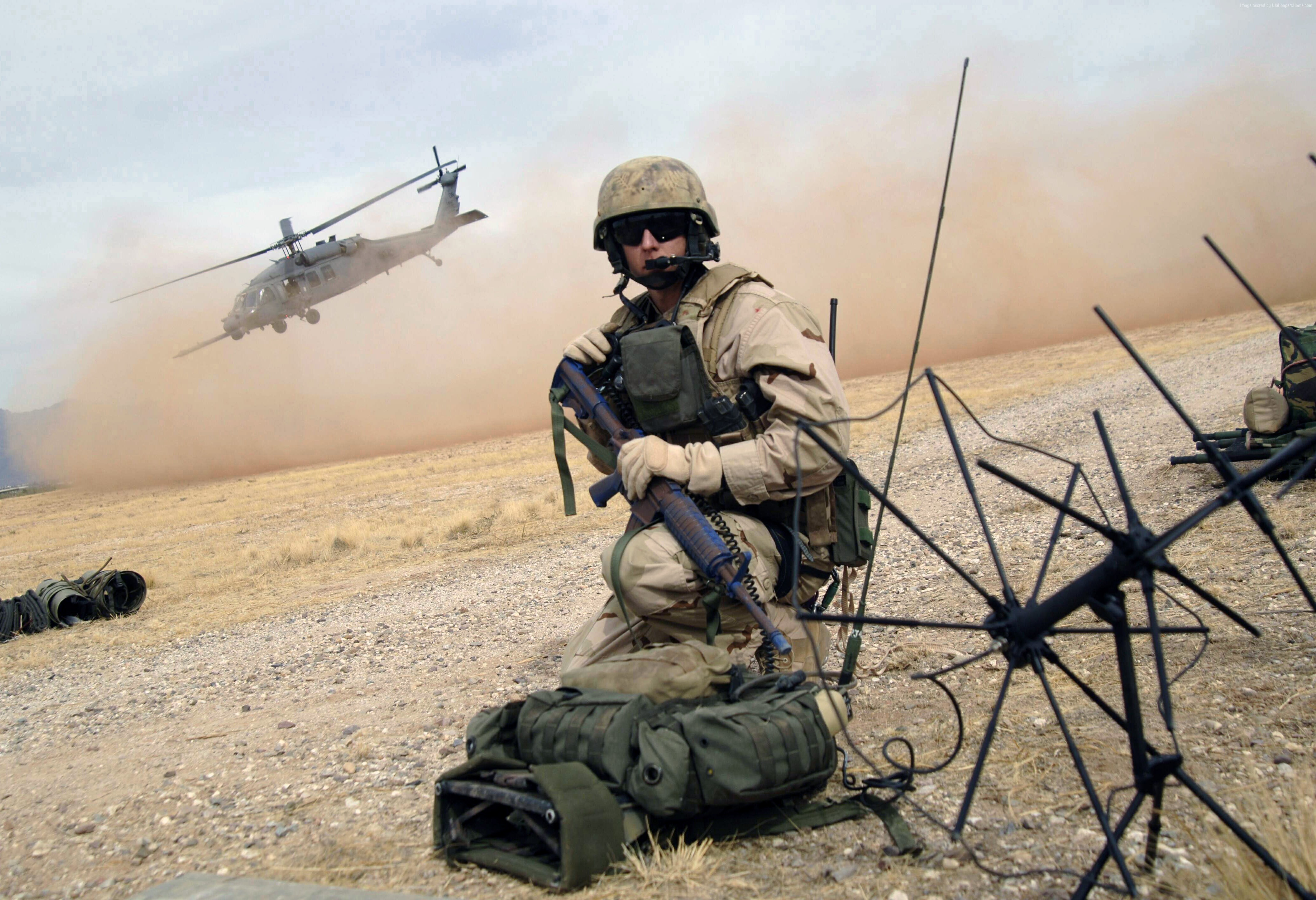 Soldier with helicopter and radio equipment HD Wallpaper
