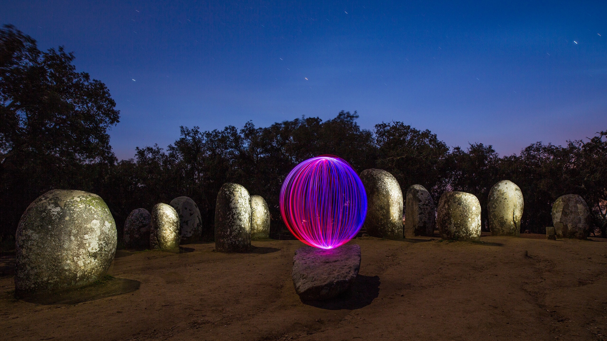 Light painting sphere among megaliths at night HD Wallpaper