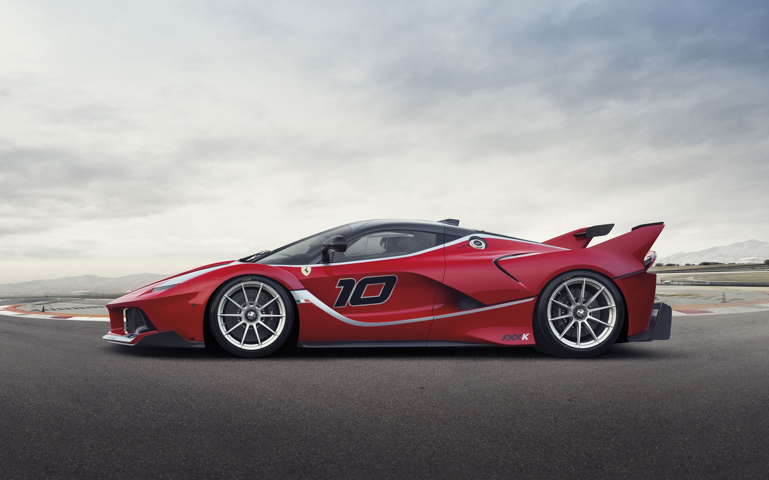 Red Ferrari FXX K race car with number 10 HD Wallpaper
