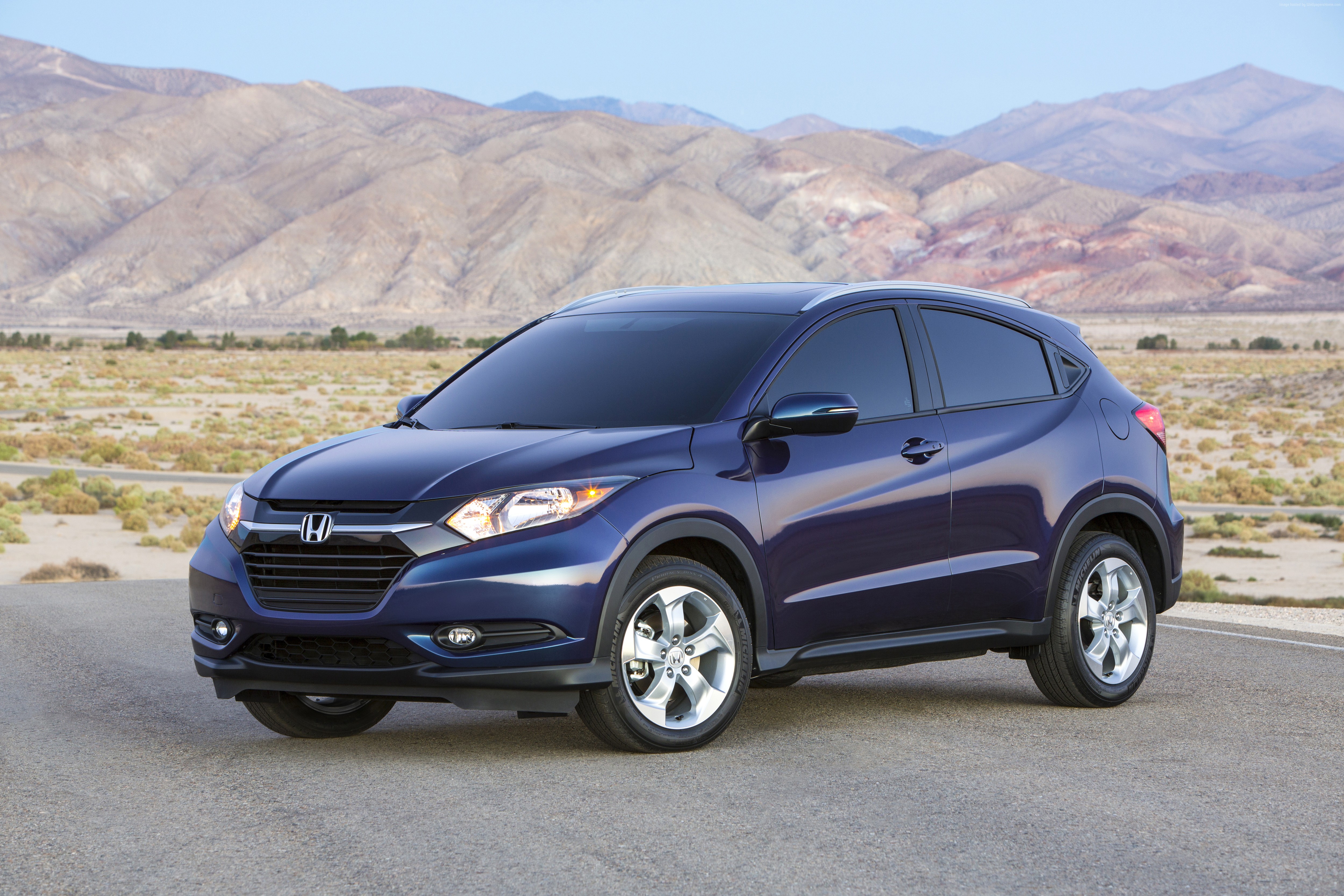 Blue Honda HR-V crossover SUV parked on a road with mountains HD Wallpaper