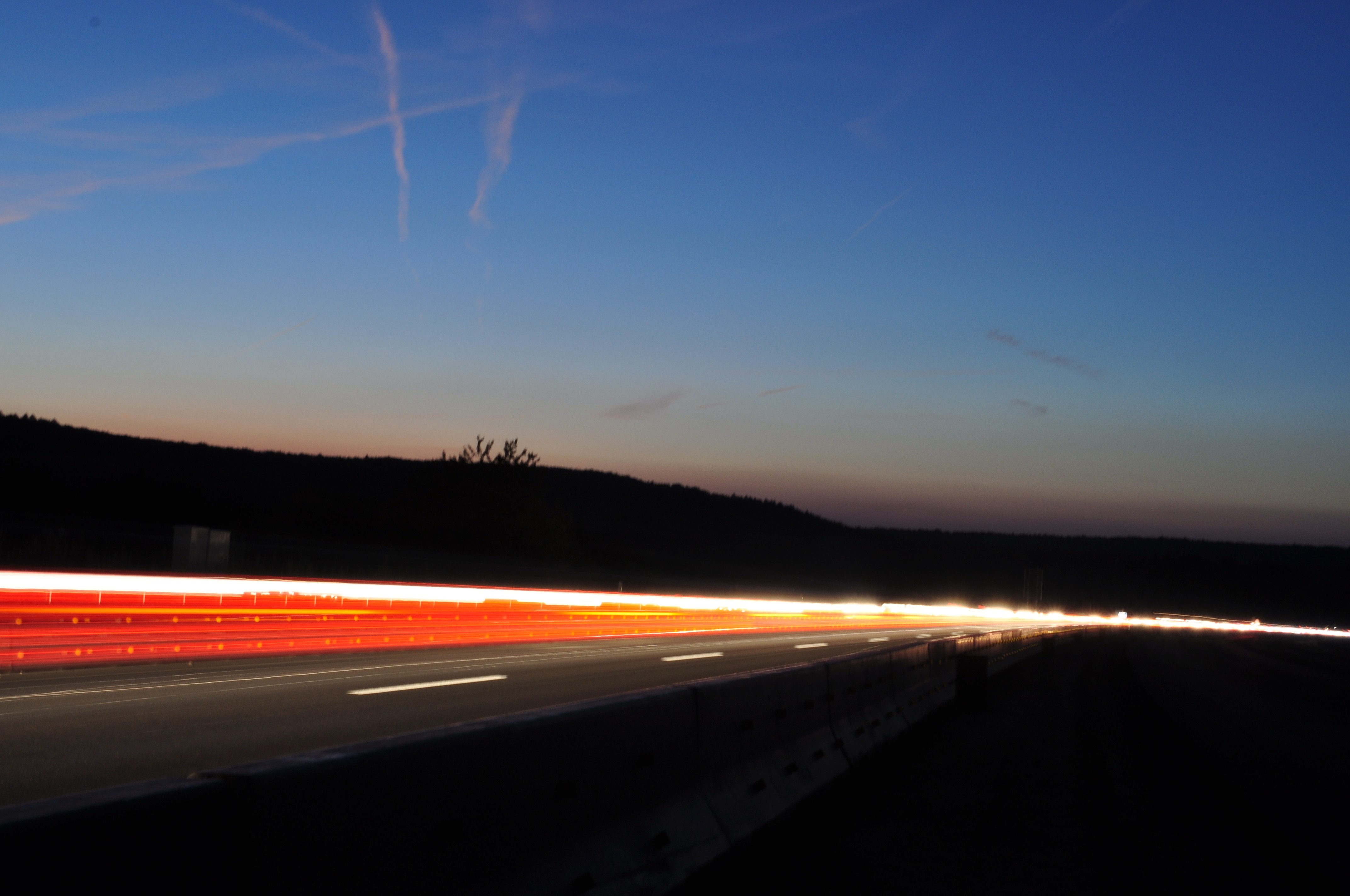 Long exposure of highway lights at dusk HD Wallpaper