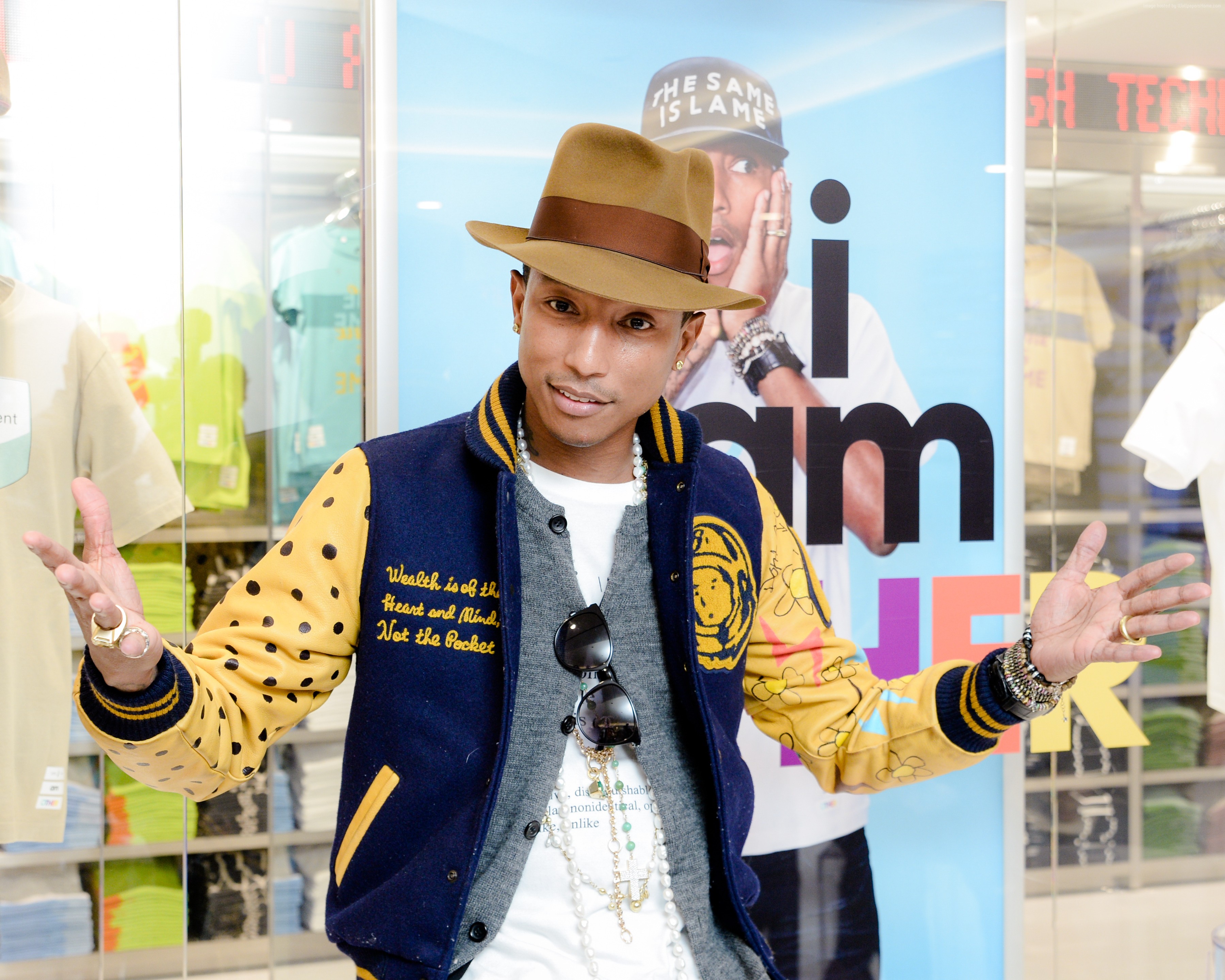 Pharrell Williams wearing a hat and jacket HD Wallpaper