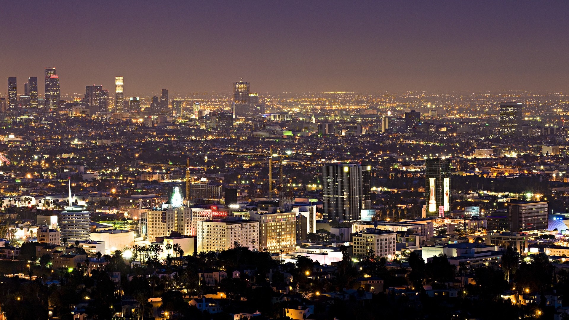 Nighttime cityscape of Los Angeles with illuminated skyscrapers HD Wallpaper