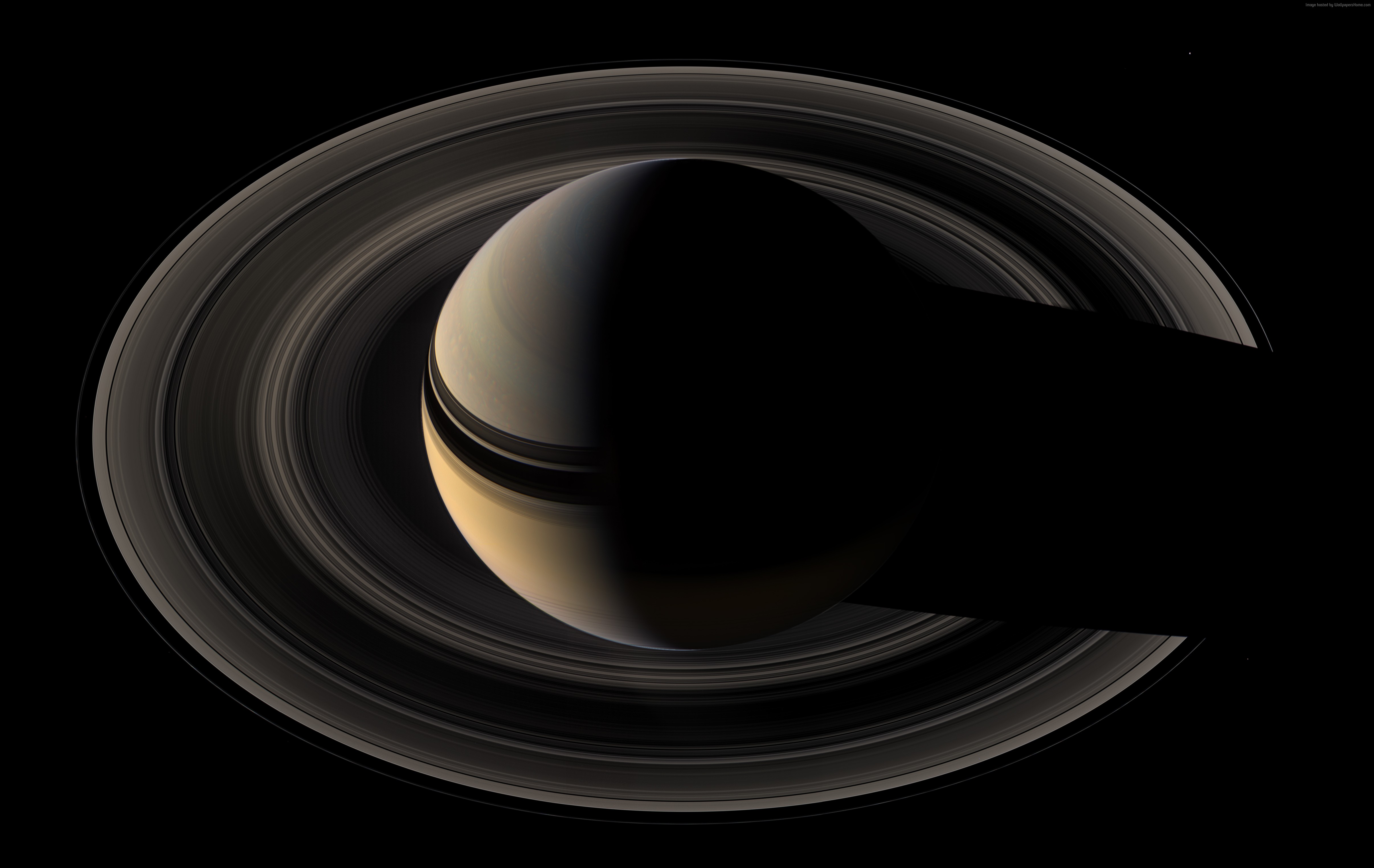 Saturn and its rings HD Wallpaper