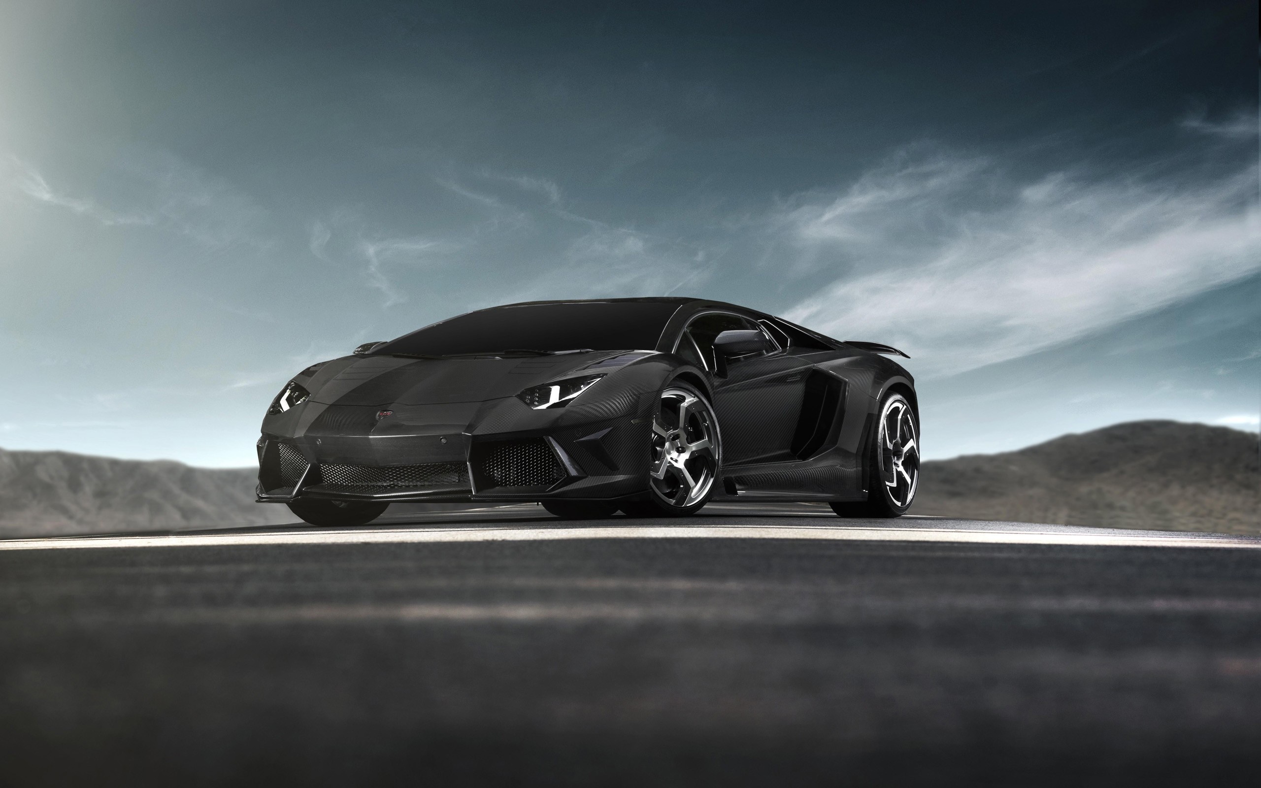 Black Lamborghini Aventador on a road HD Wallpaper