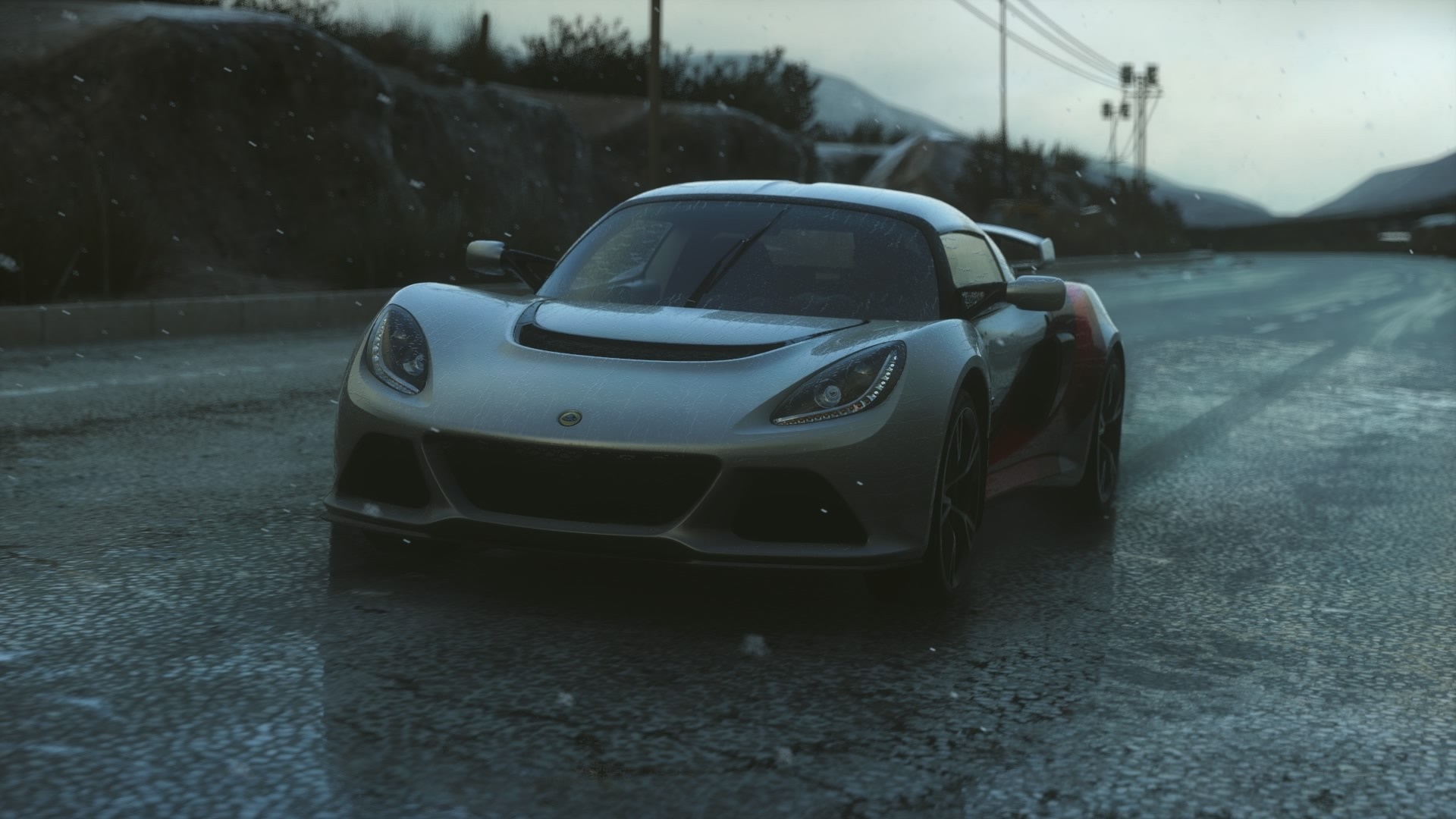 Lotus Elise sports car on a wet road HD Wallpaper