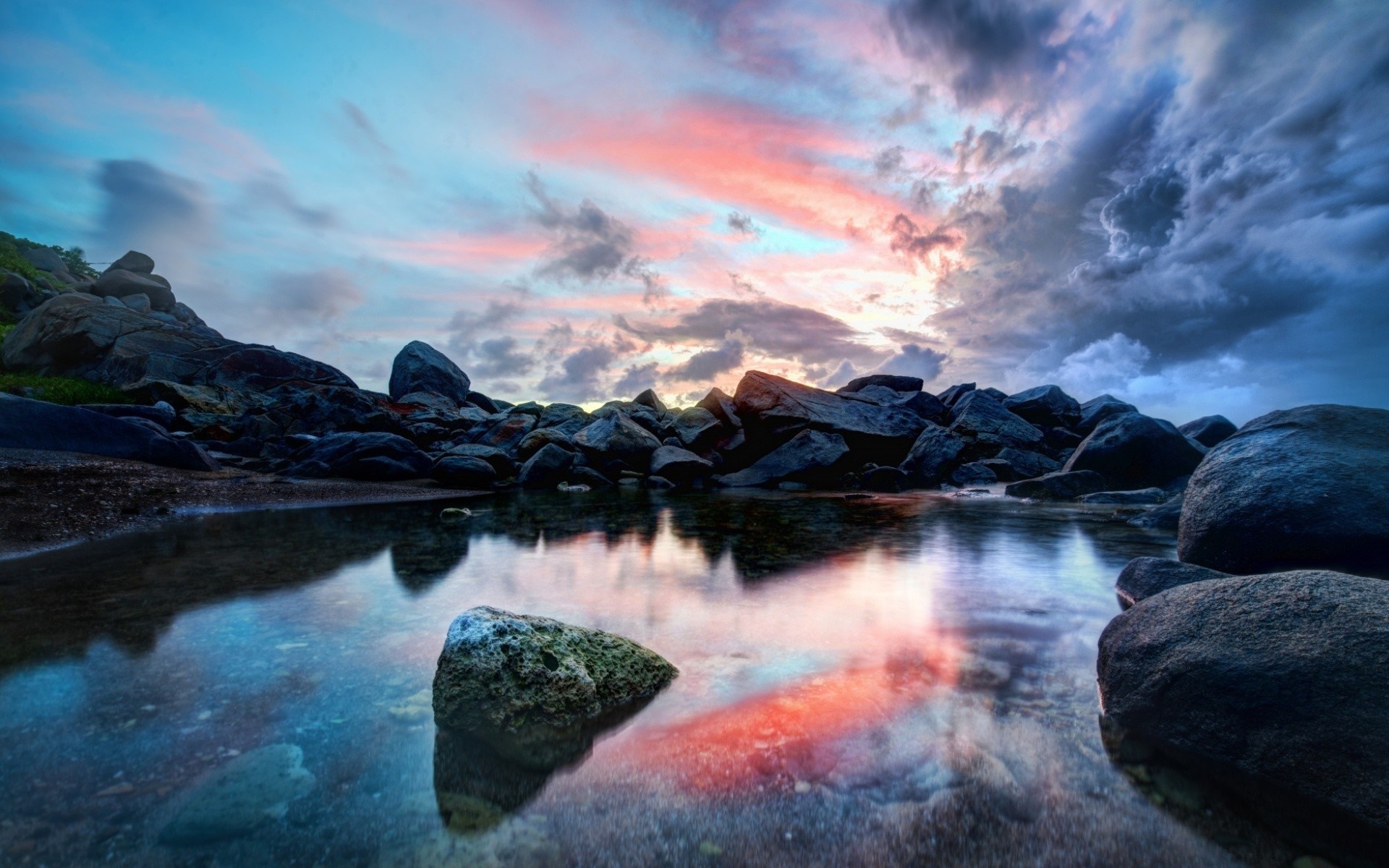 Rocky coast with reflection at sunset HD Wallpaper