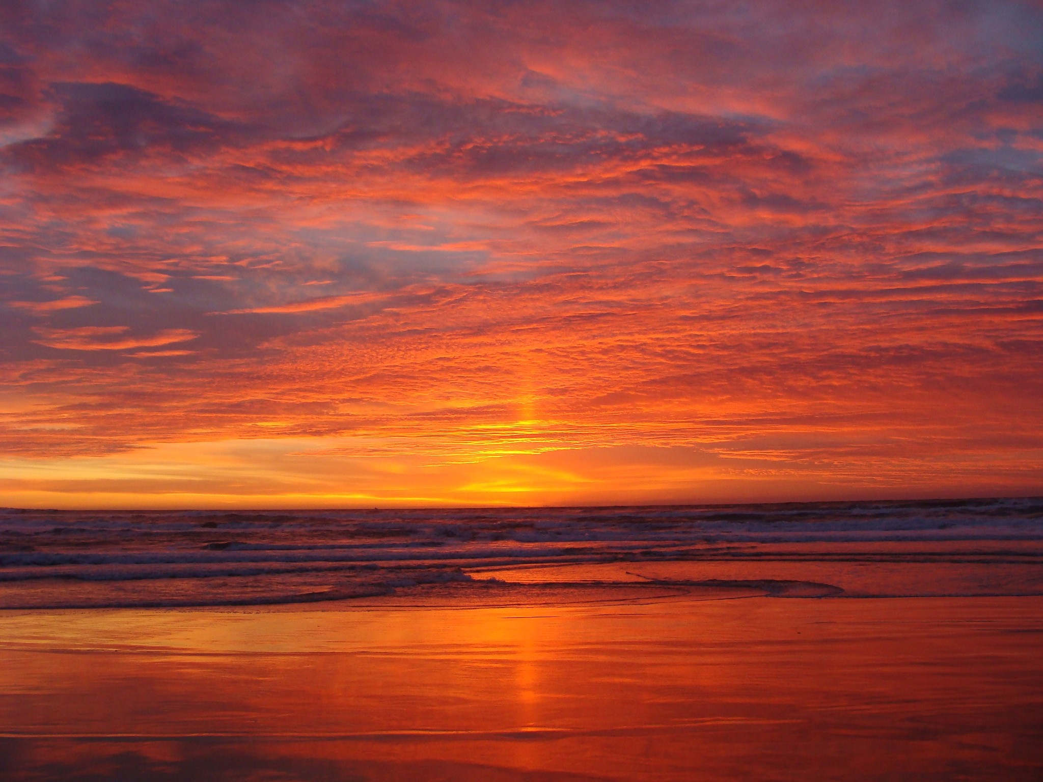 Sunset over the ocean with colorful clouds HD Wallpaper