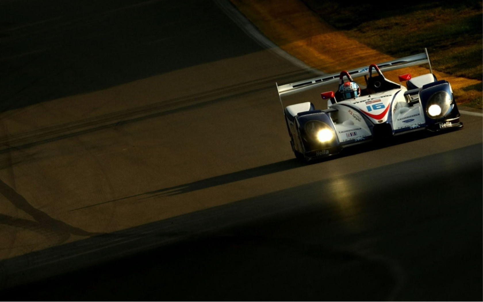 Race car number 16 on a track HD Wallpaper