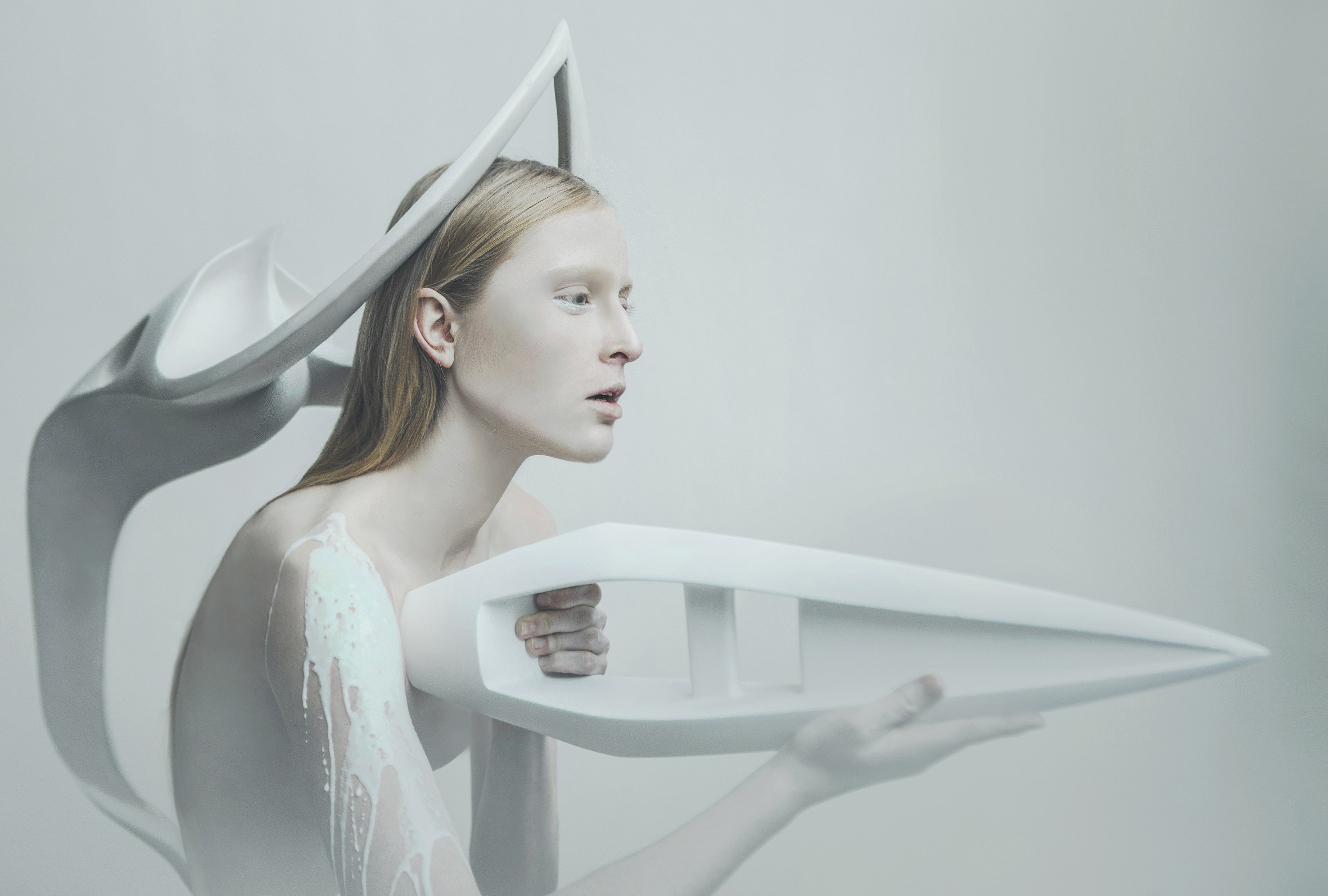 Model with futuristic headpiece and object HD Wallpaper