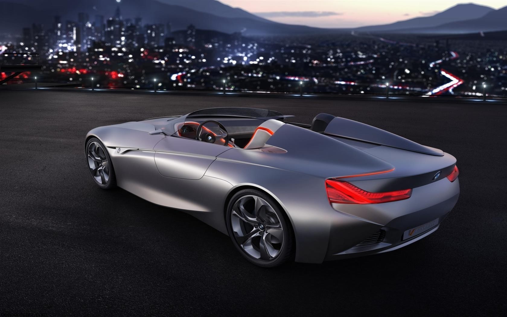 BMW concept sports car at night with city background HD Wallpaper