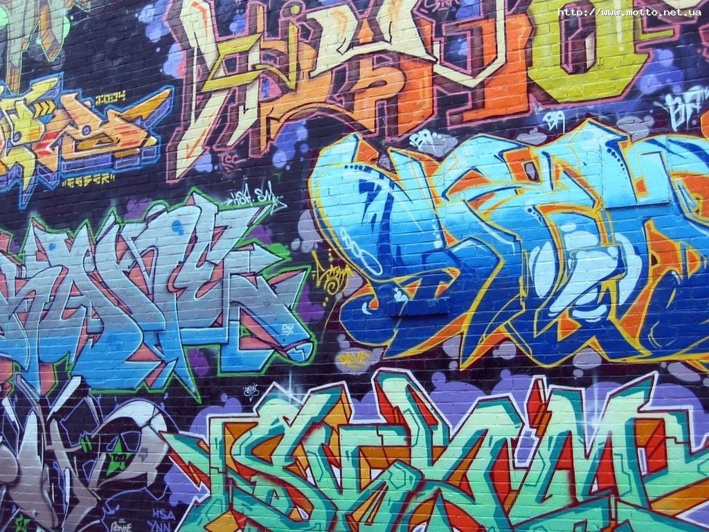 Graffiti art on a brick wall HD Wallpaper