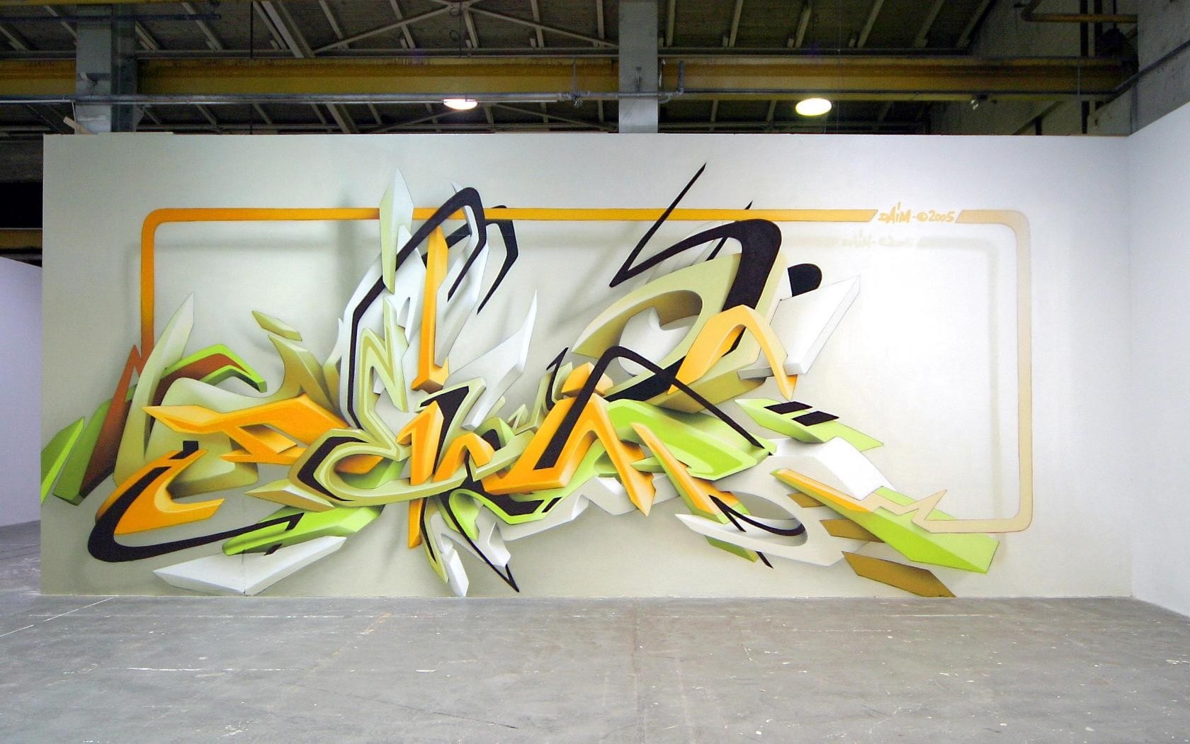 Graffiti art on a wall with orange frame HD Wallpaper