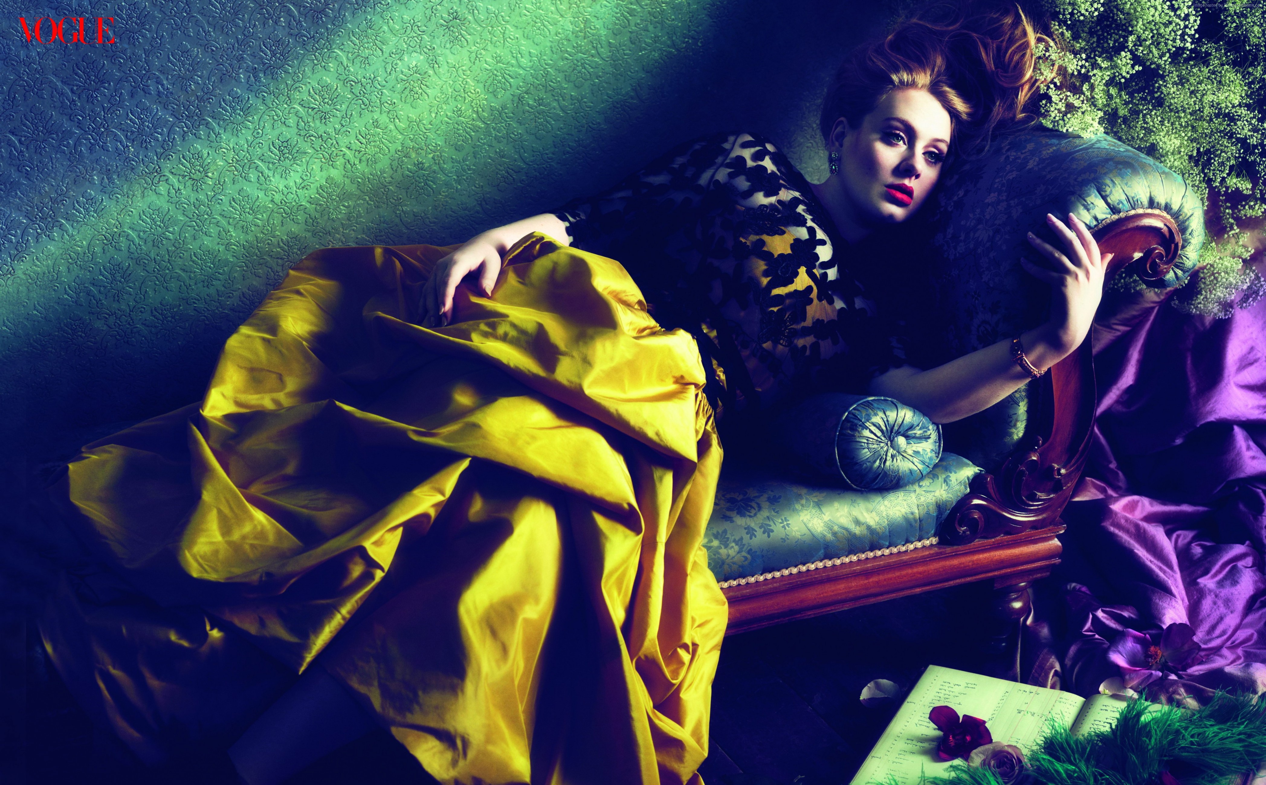 Adele on a vintage sofa with yellow and purple fabric HD Wallpaper