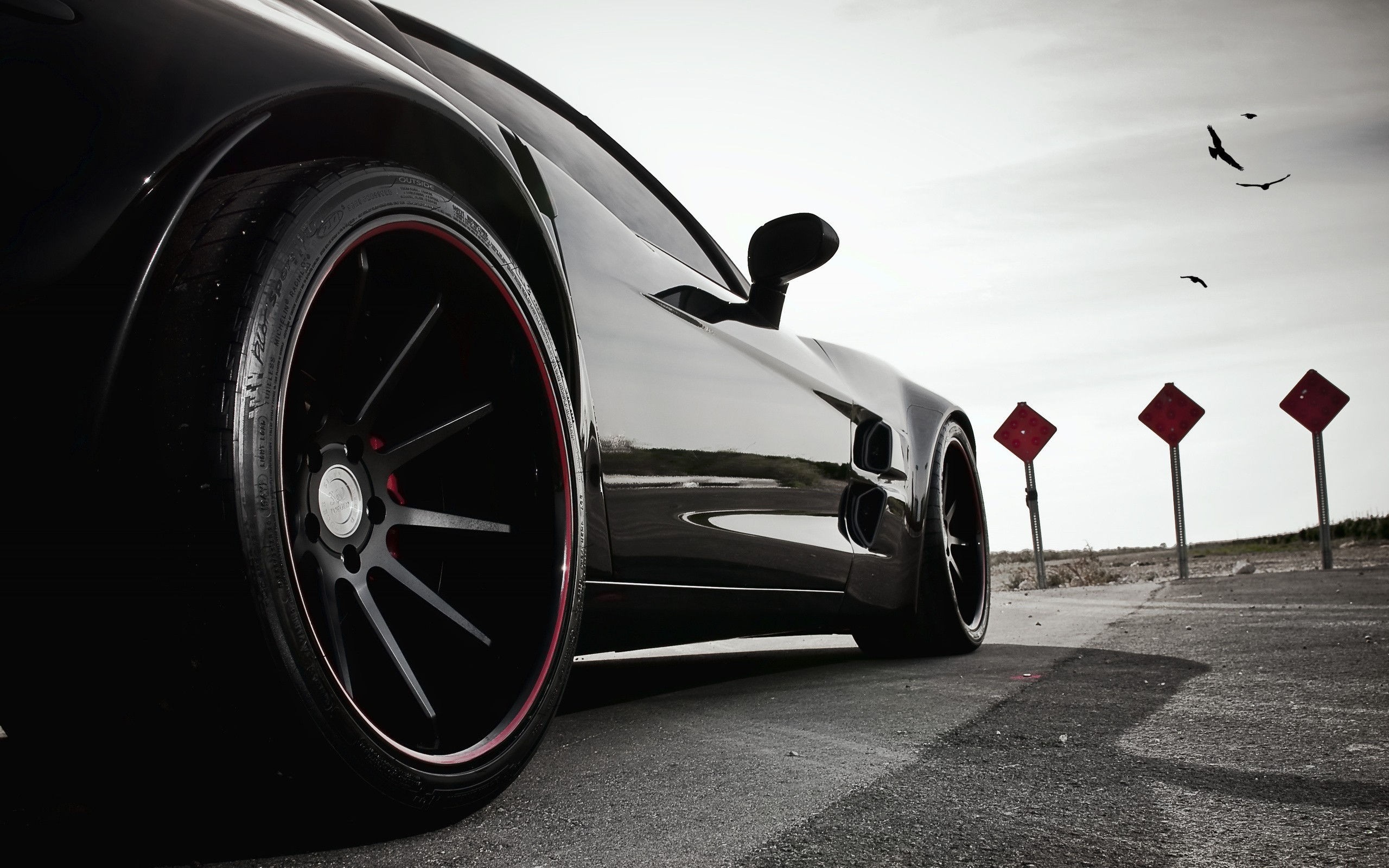 Black Chevrolet Corvette C6 ZR1 sports car on road HD Wallpaper