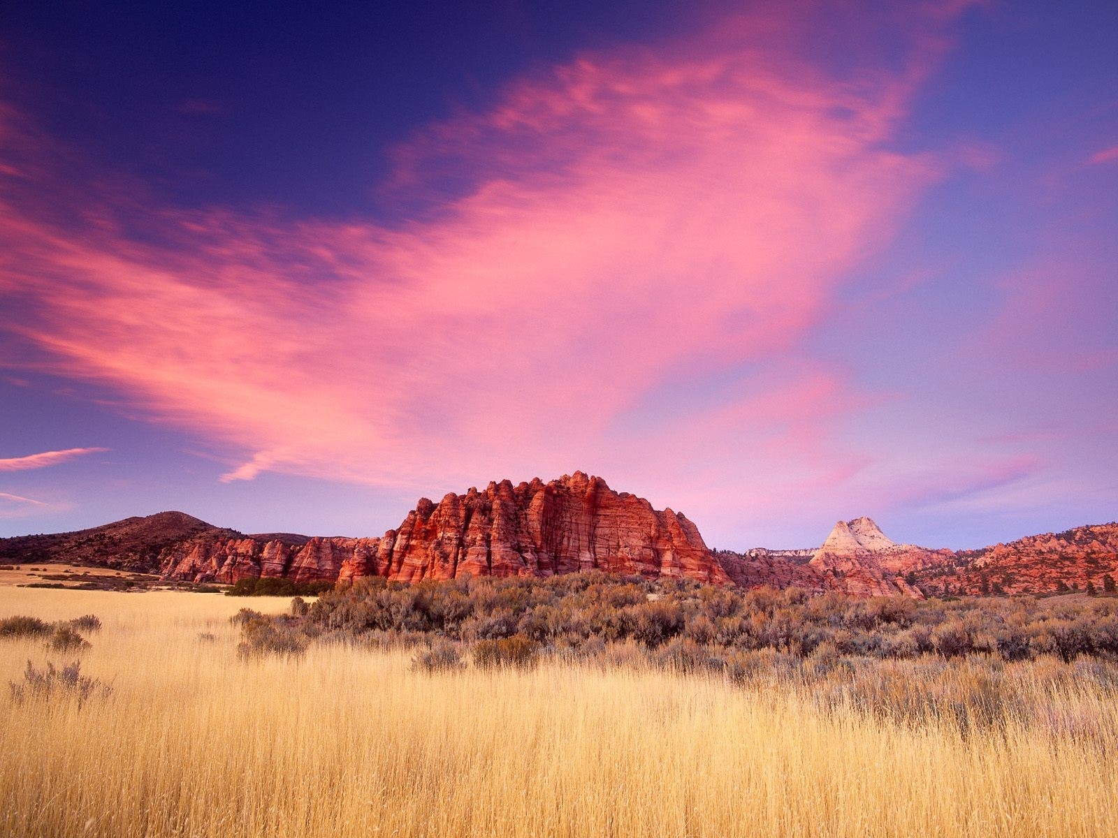 Desert landscape at sunset with colorful clouds HD Wallpaper
