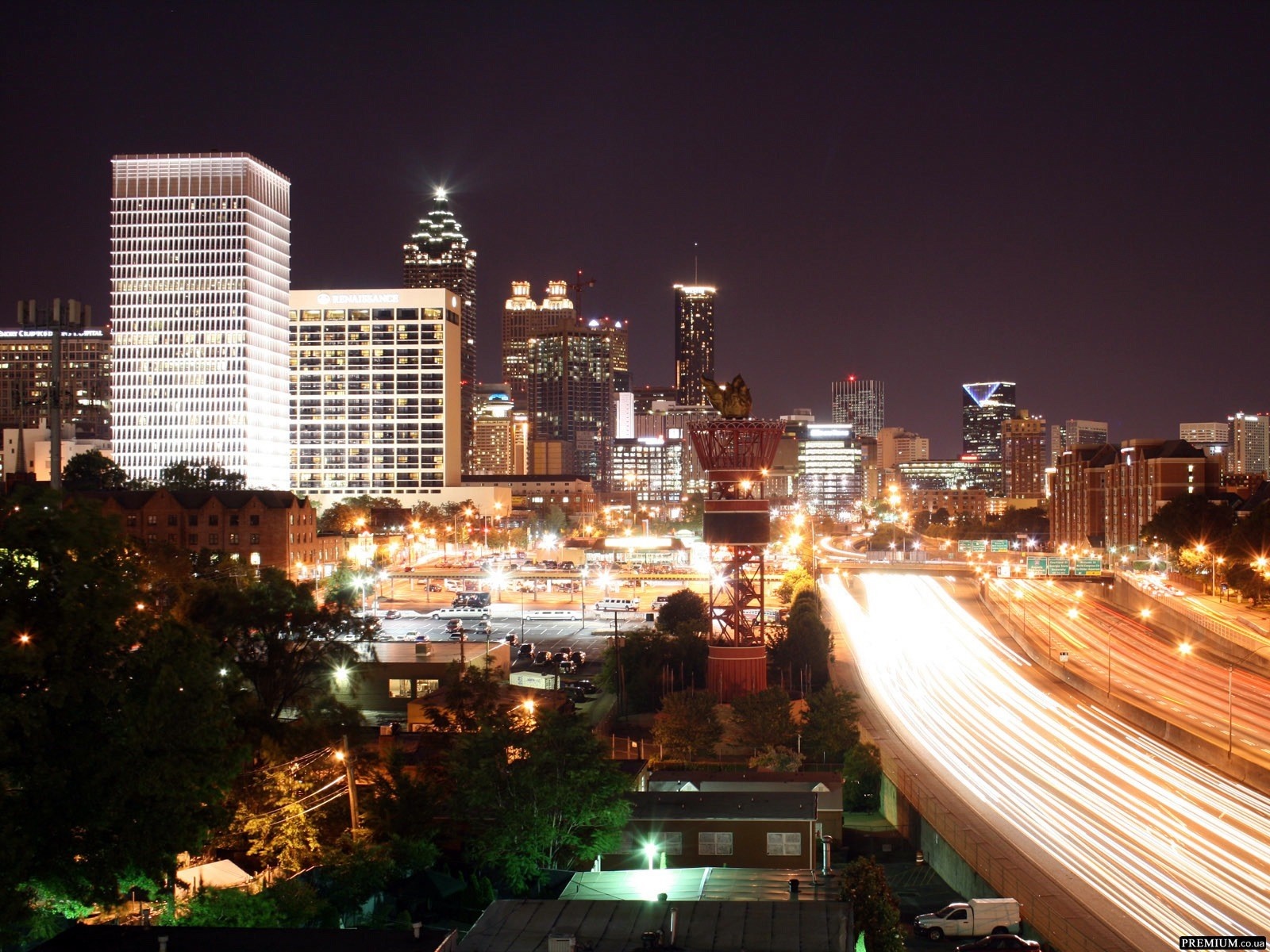 Atlanta cityscape at night with light trails on highway HD Wallpaper