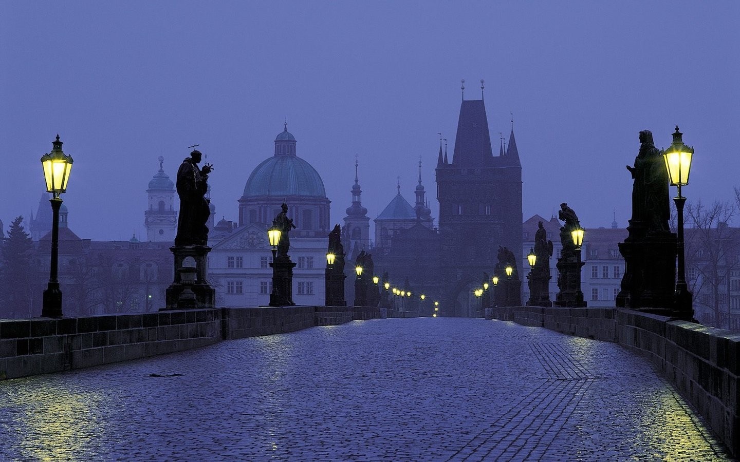 Charles Bridge at dawn with statues and gas lamps HD Wallpaper