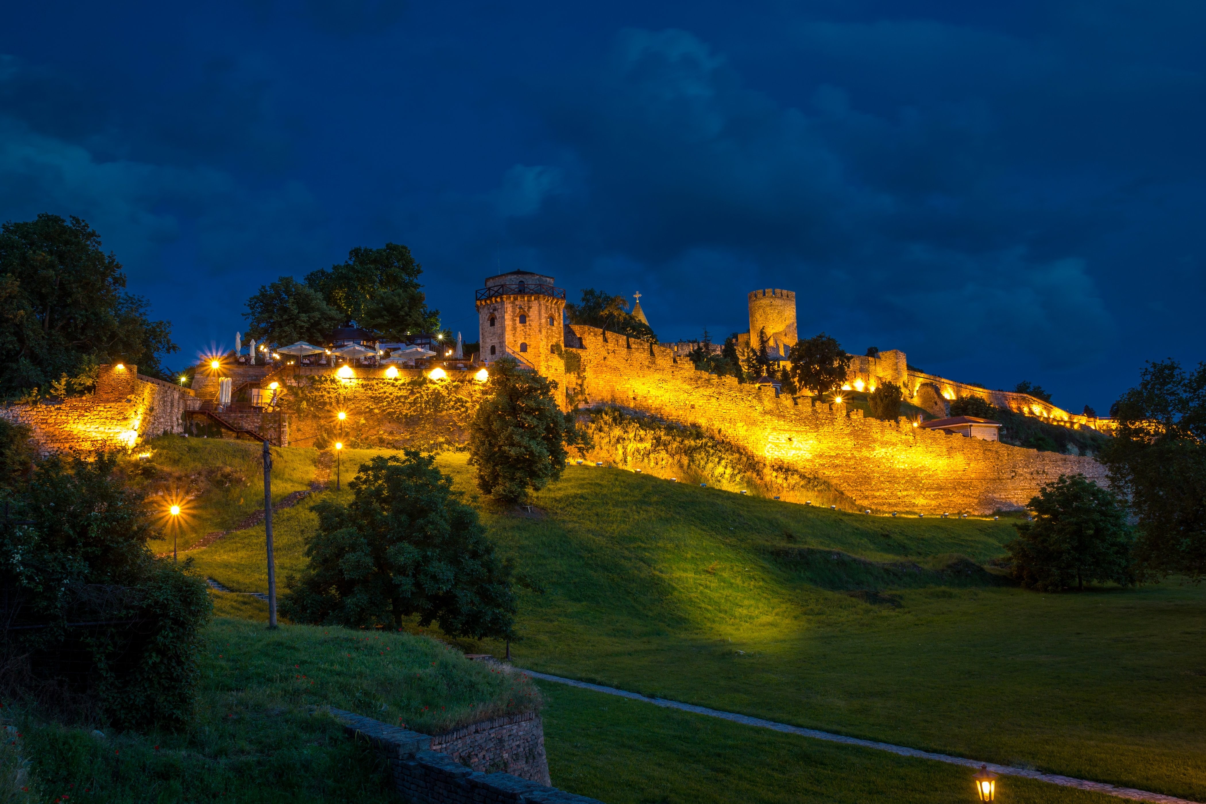 Belgrade Fortress at night with illuminated walls and towers HD Wallpaper