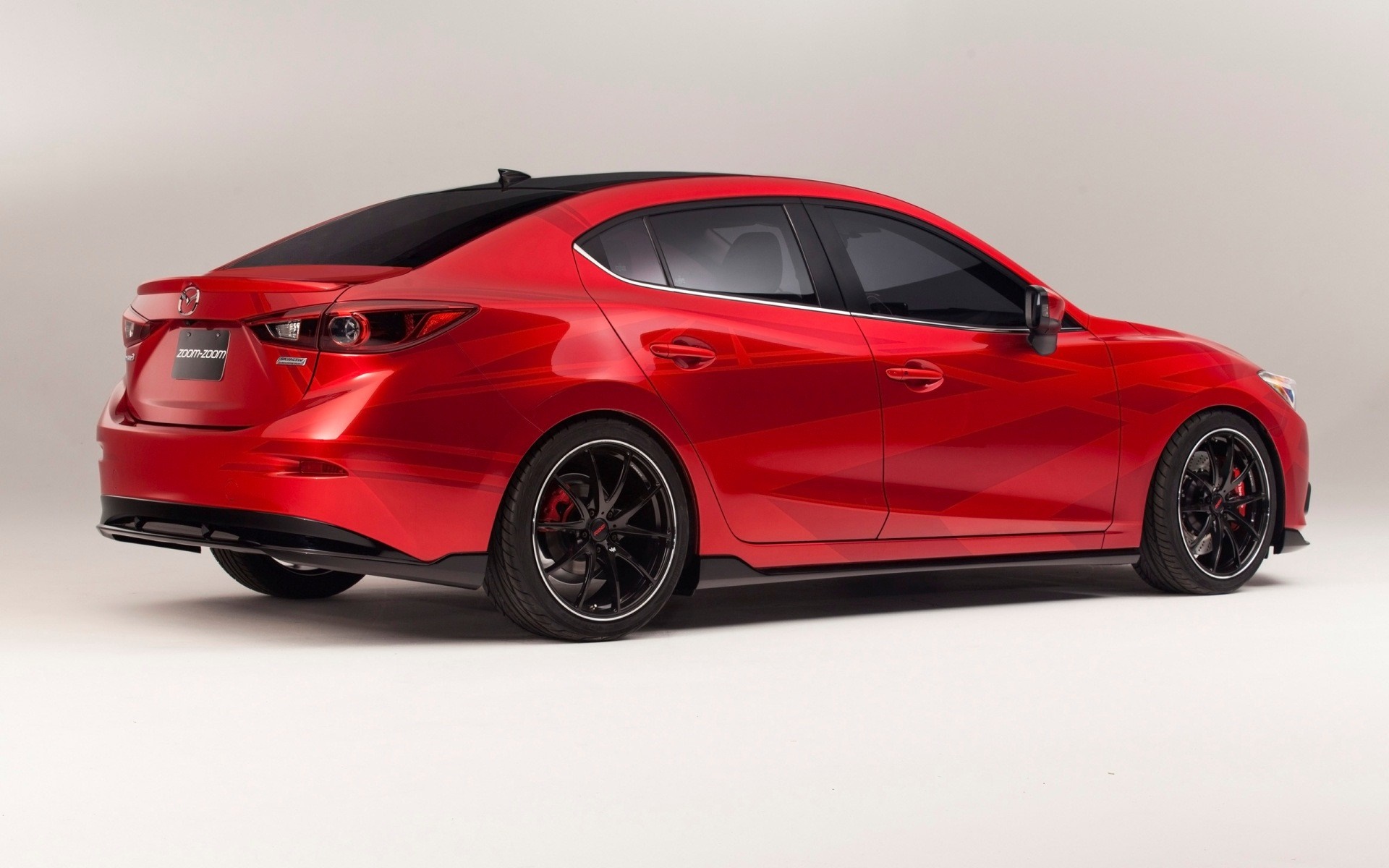 Red Mazda 3 Sedan with custom wheels HD Wallpaper