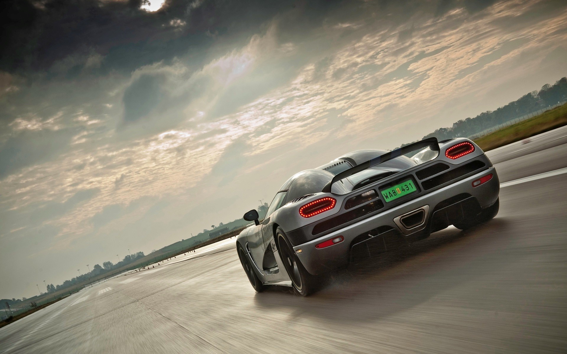 Koenigsegg Agera driving on a track HD Wallpaper