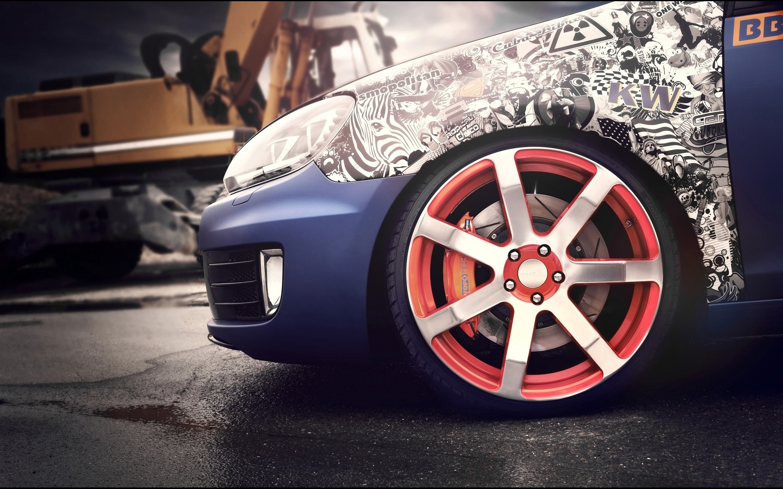 Blue car with sticker bomb hood and red rim HD Wallpaper