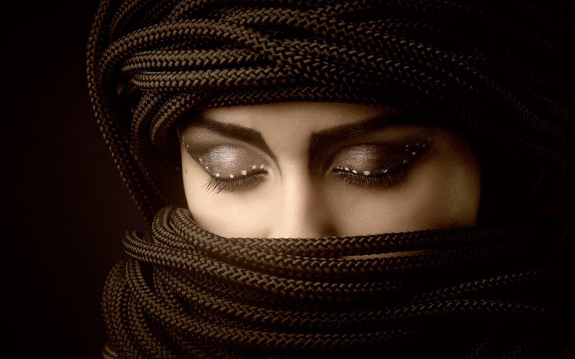 Woman with elaborate makeup and head covering HD Wallpaper