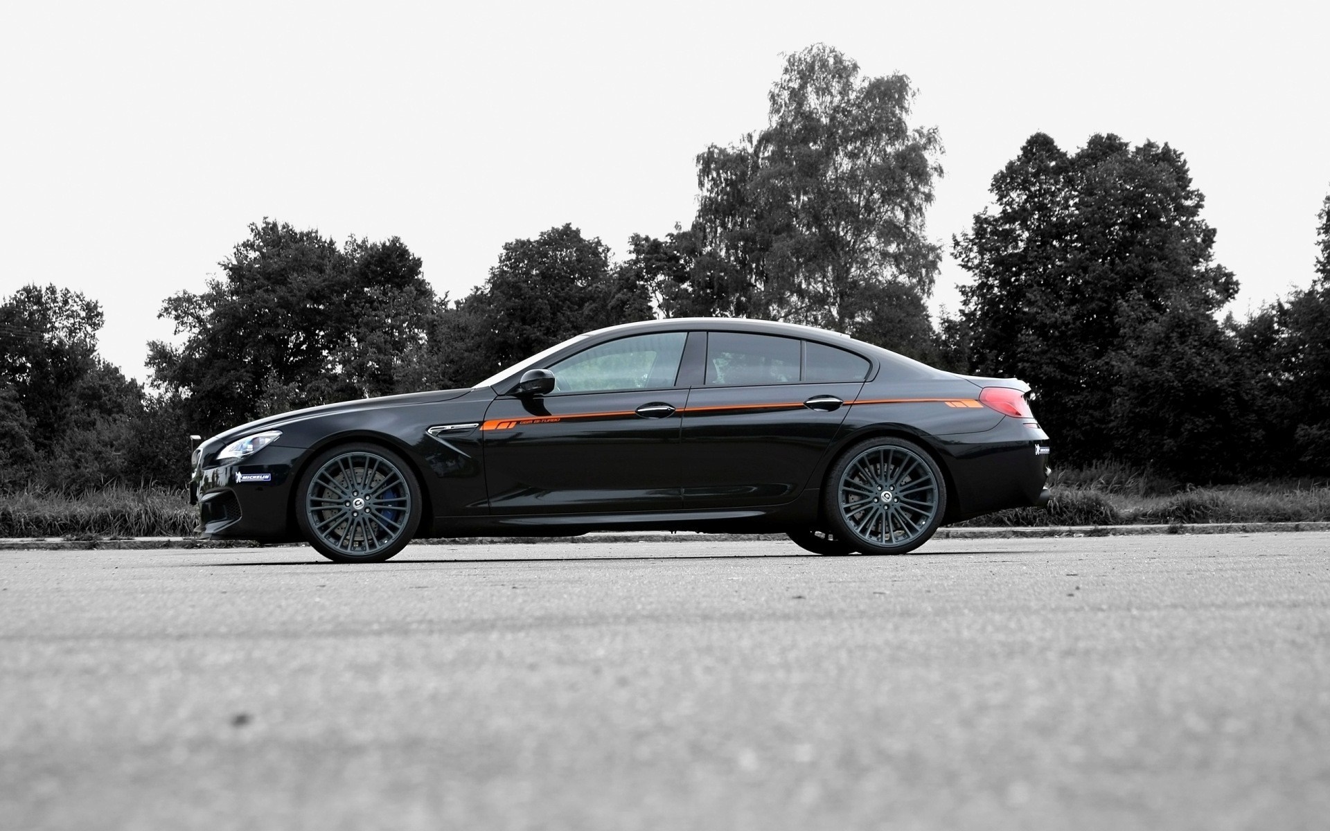 Black BMW M6 Gran Coupe with orange accents HD Wallpaper
