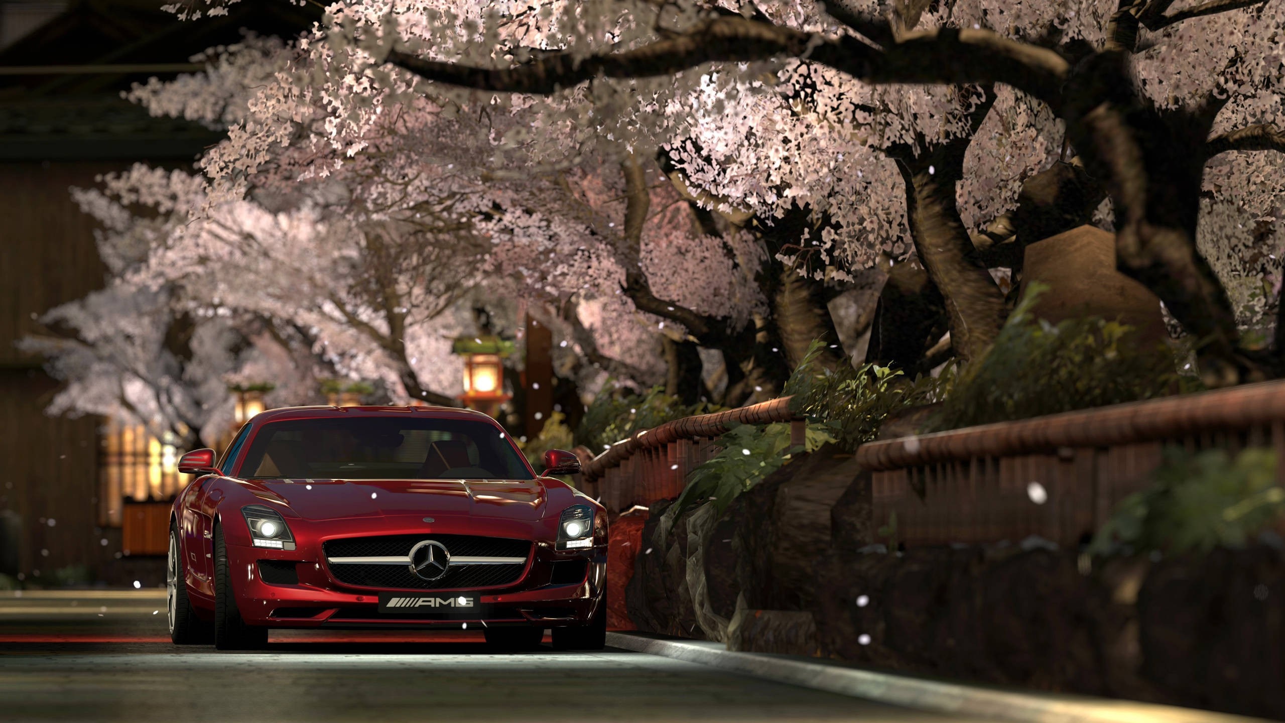 Mercedes-Benz SLS AMG driving through cherry blossoms HD Wallpaper