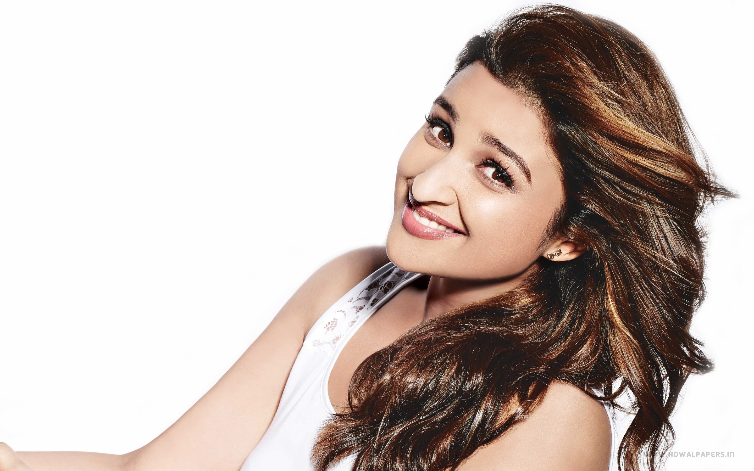 Parineeti Chopra in a white tank top, studio portrait HD Wallpaper