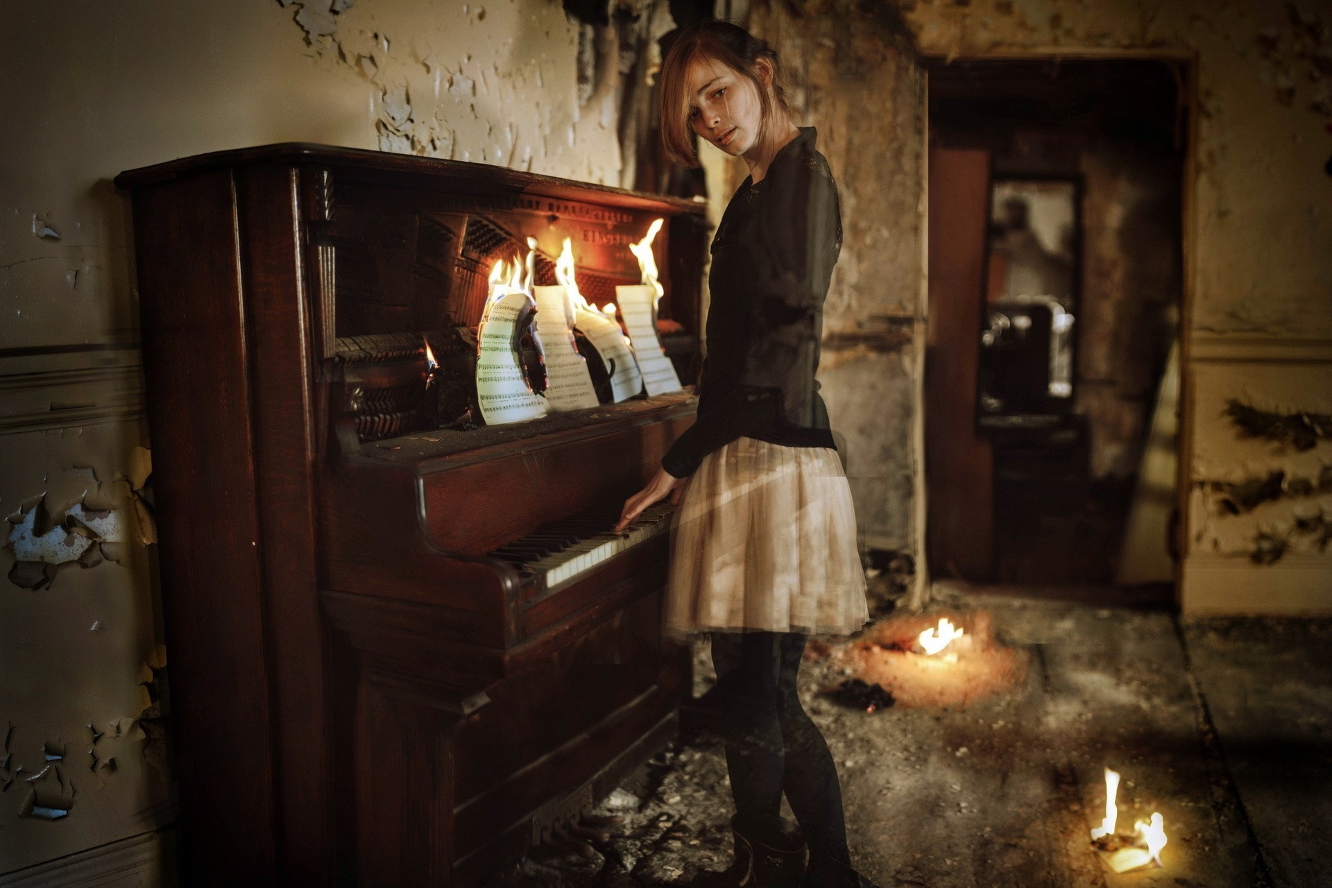 Woman playing a burning piano in an abandoned room HD Wallpaper