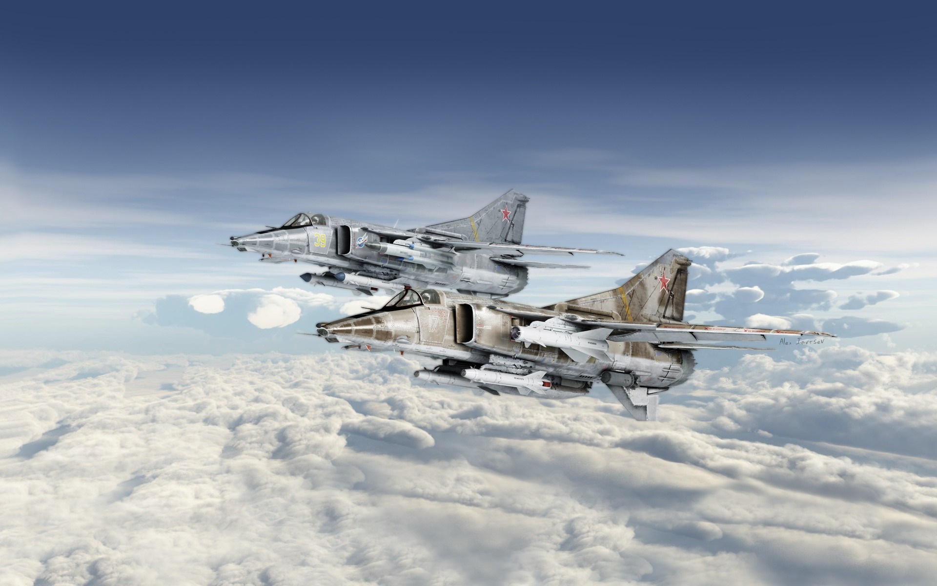 Two Mikoyan MiG-27 fighter jets flying above clouds HD Wallpaper