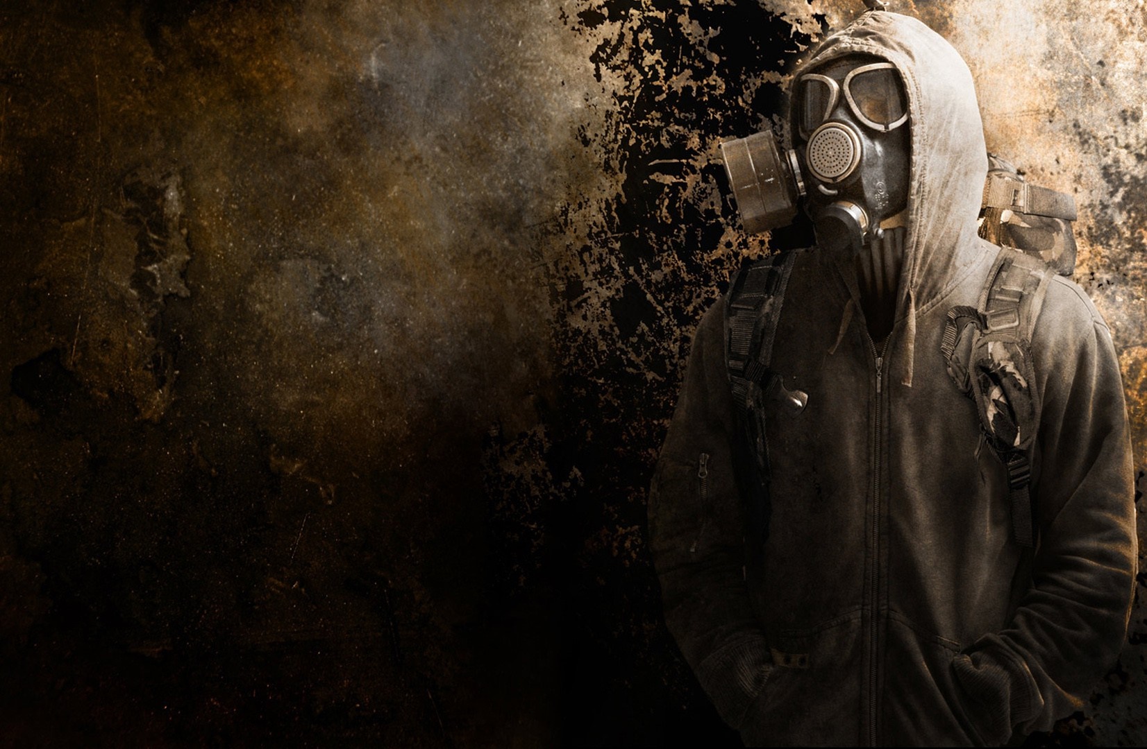 Man in gas mask and hoodie with backpack HD Wallpaper