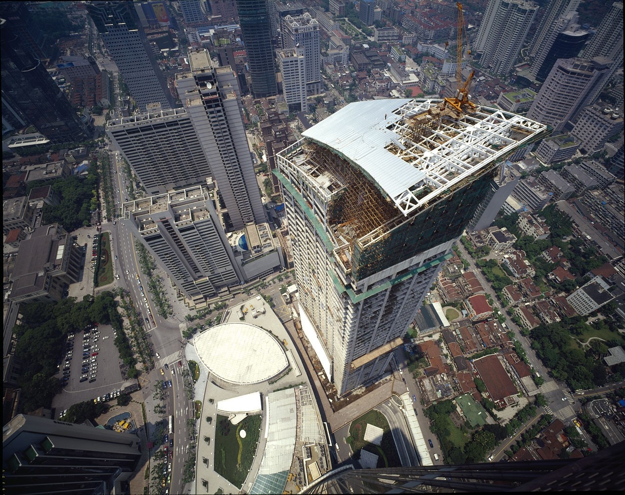 Aerial view of a city skyscraper construction site HD Wallpaper