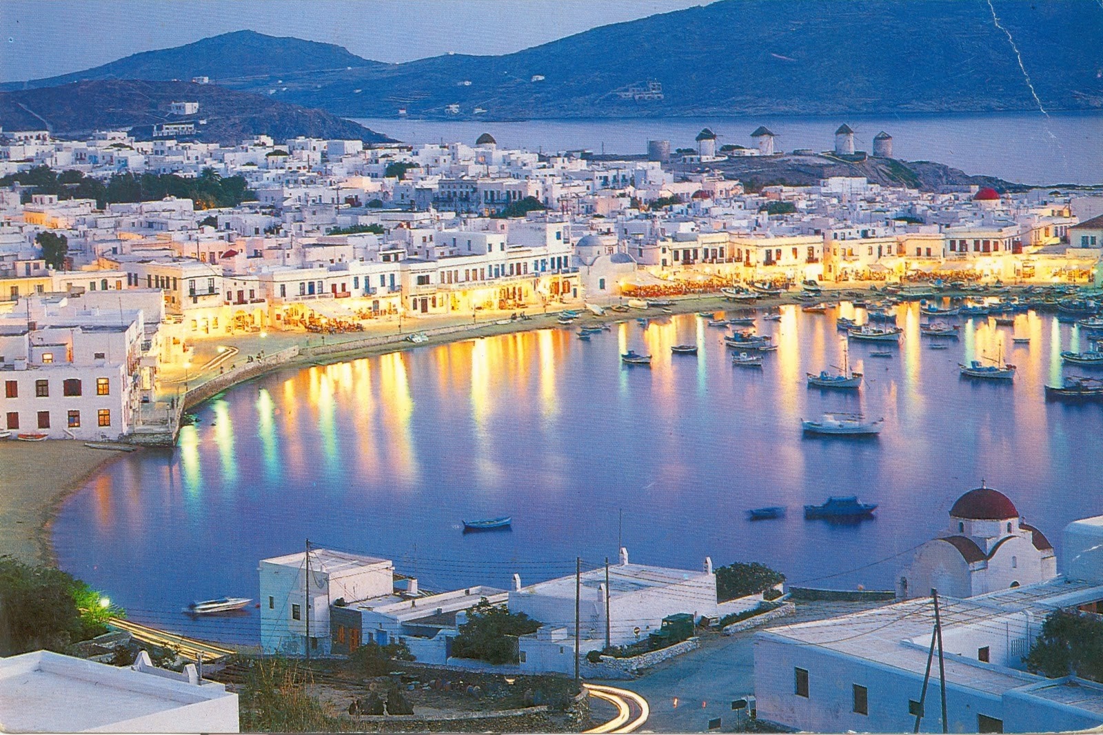 Mykonos Town harbor at dusk with windmills in the background HD Wallpaper