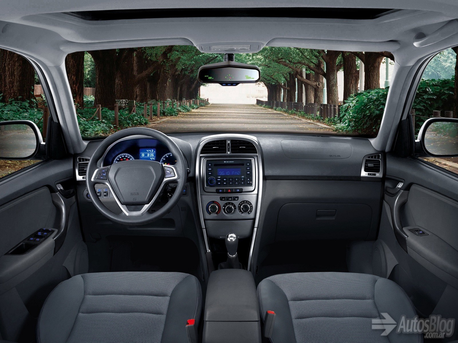 Interior view of a car dashboard and seats HD Wallpaper