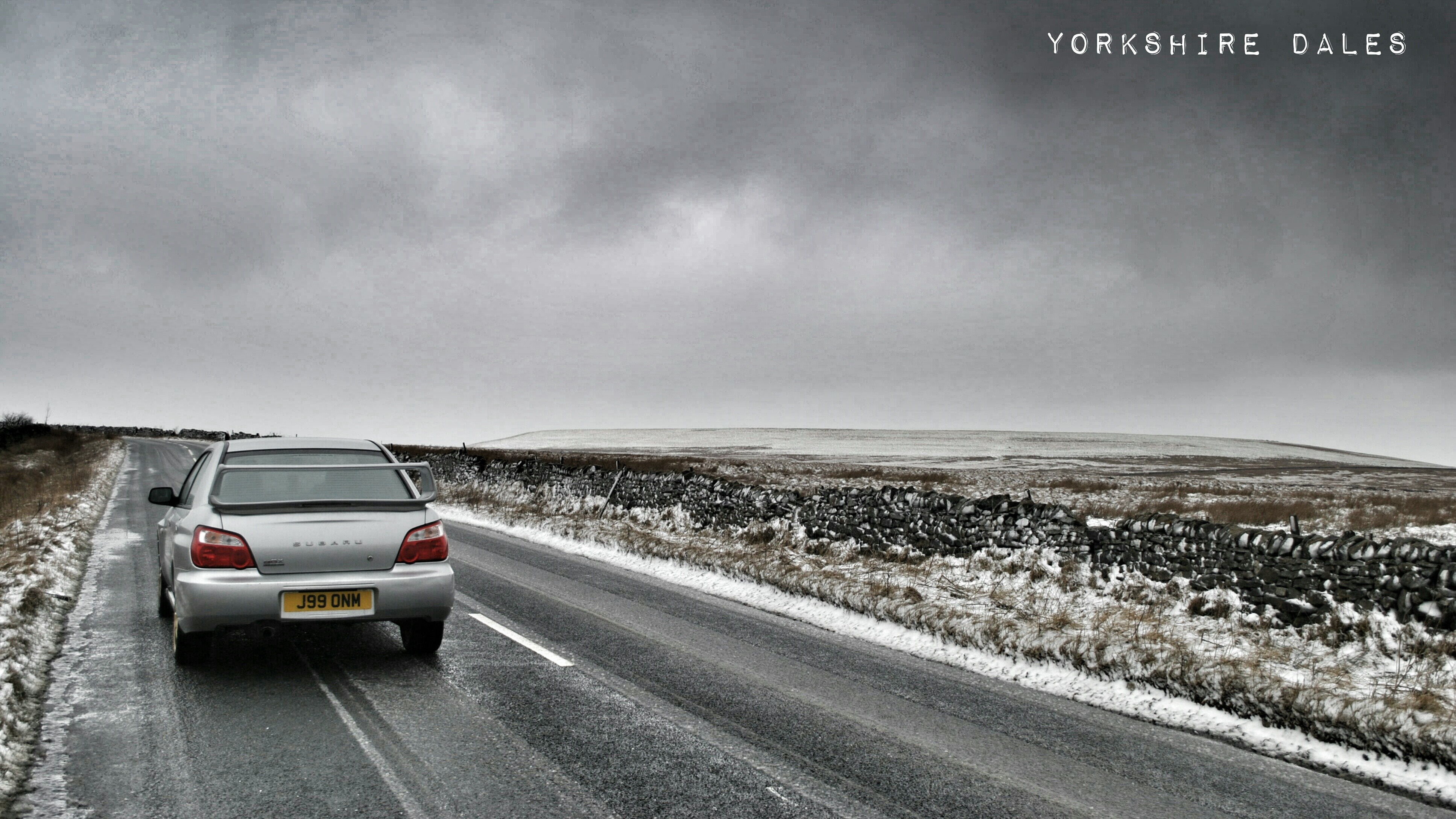 Silver Subaru Impreza on a Snowy Road in Yorkshire Dales HD Wallpaper