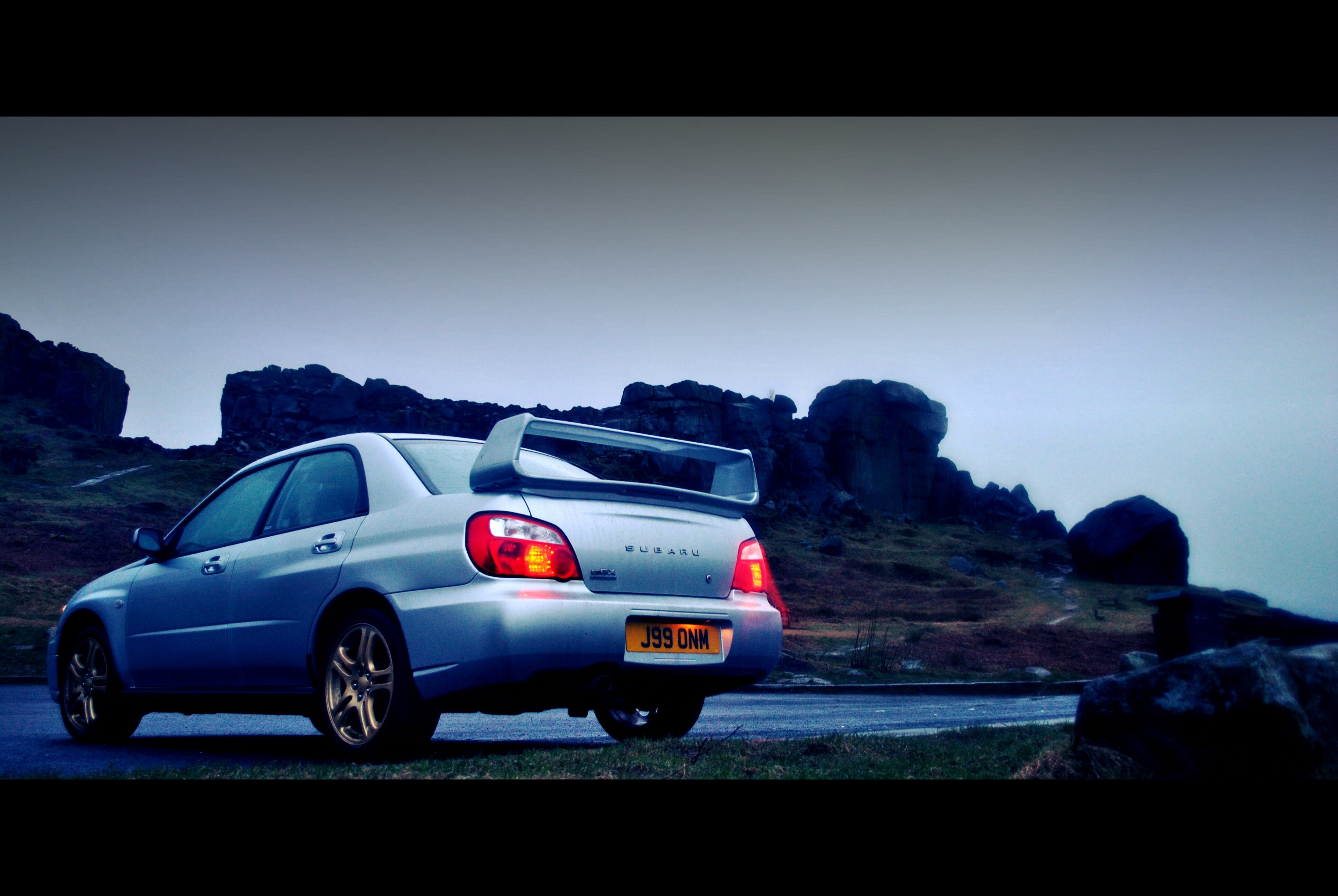 Silver Subaru Impreza WRX STI with large spoiler HD Wallpaper