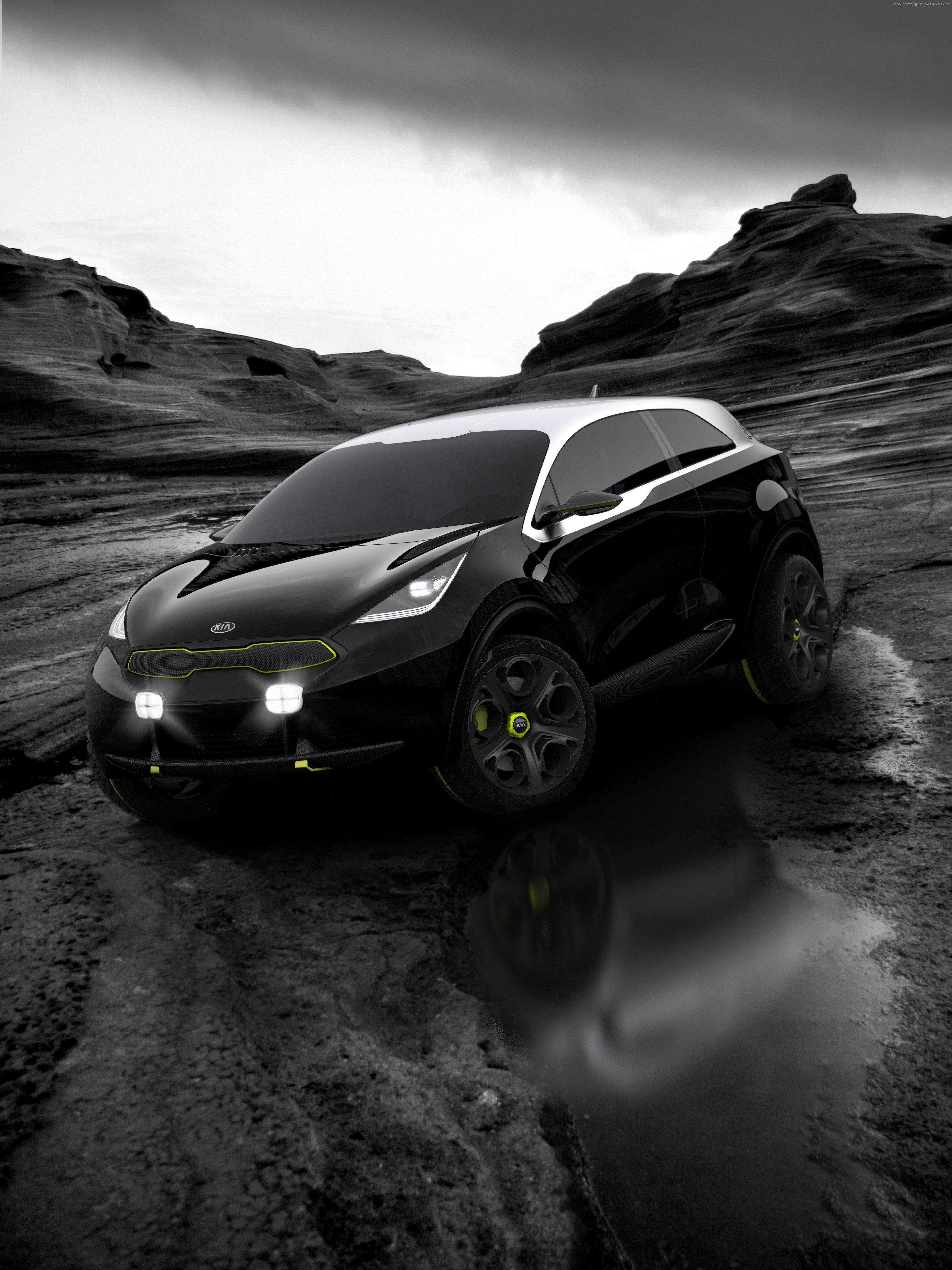 Kia Niro crossover concept car in a rocky landscape HD Wallpaper