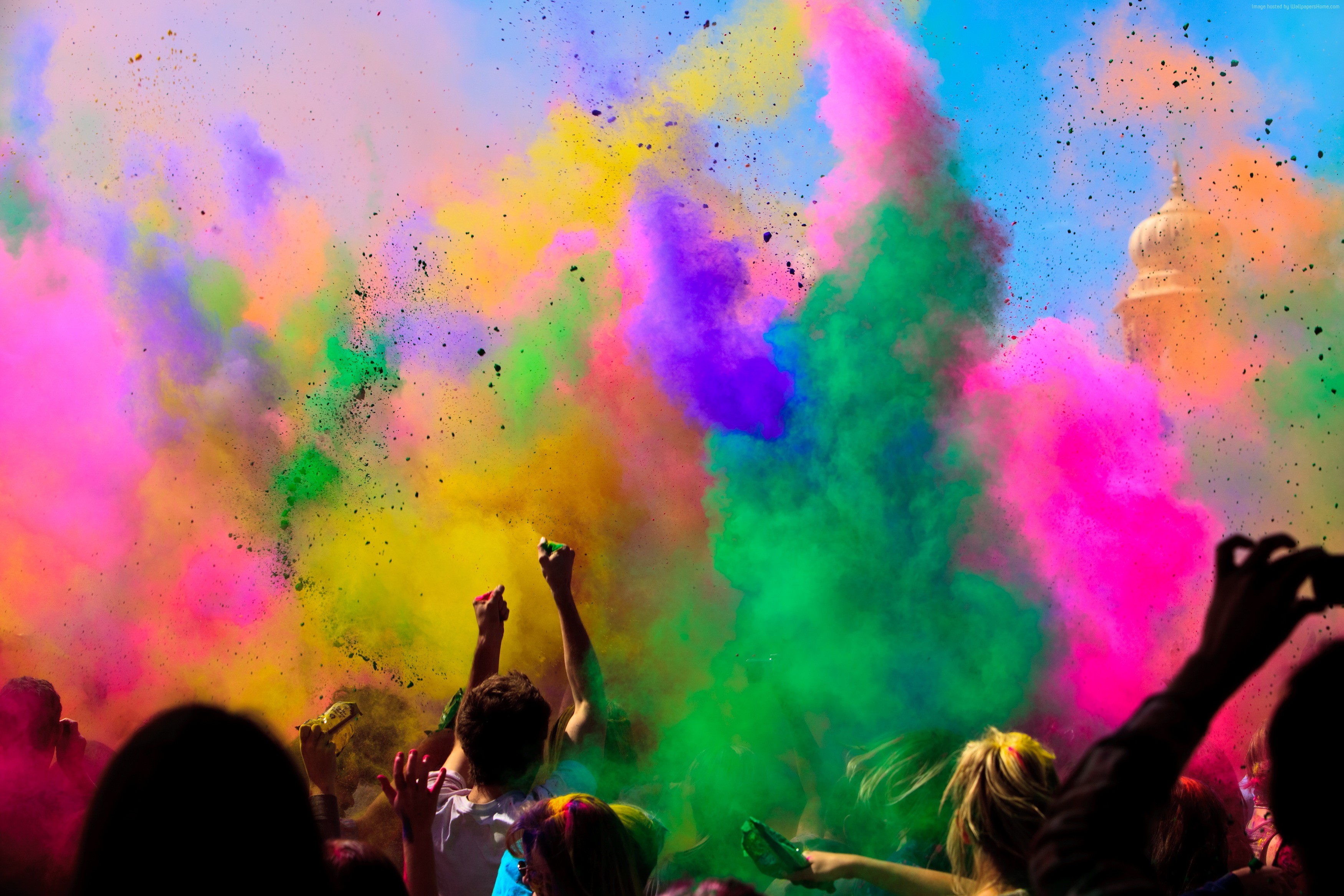 People celebrating Holi with colored powder HD Wallpaper