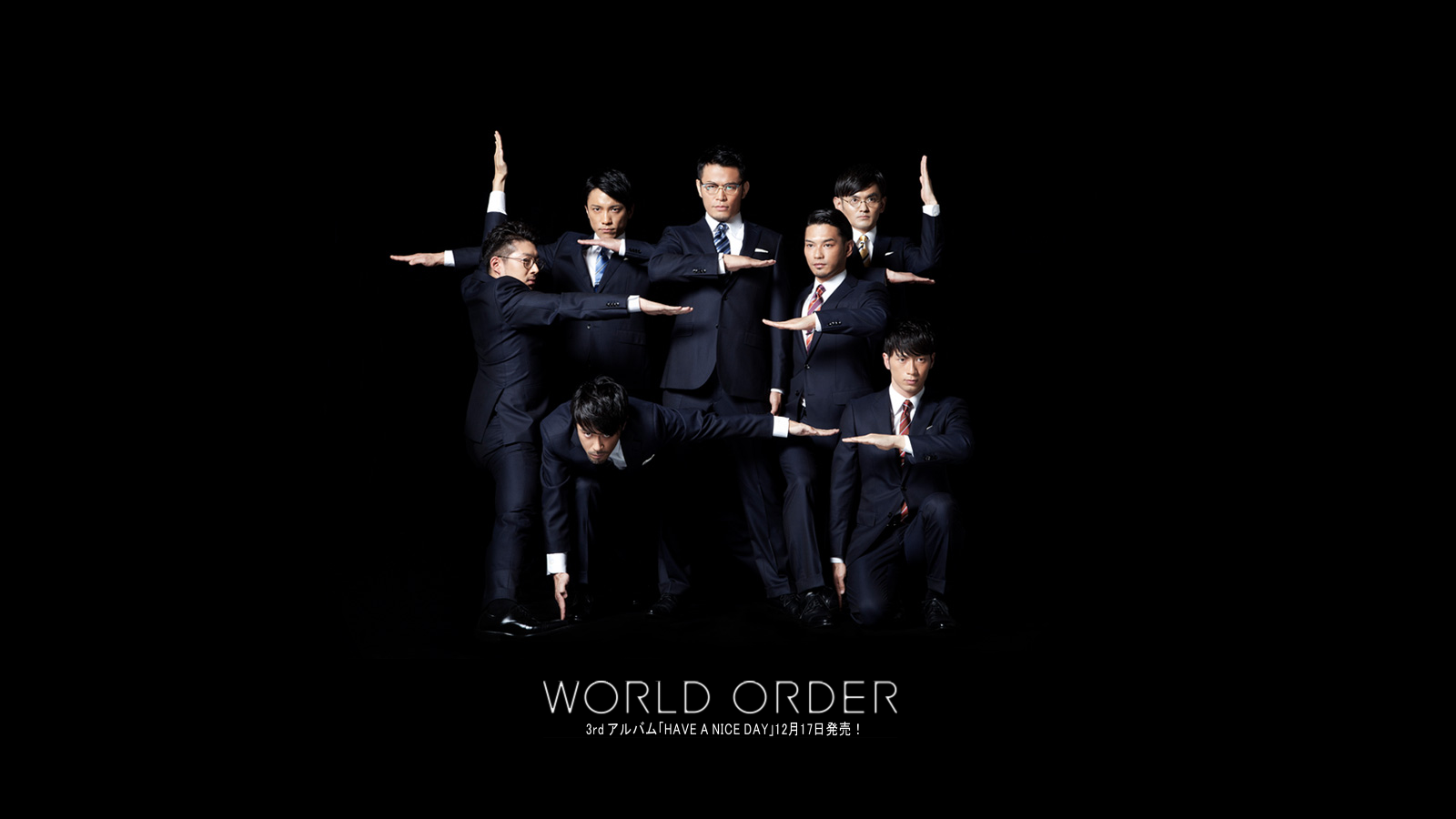 World Order group posing in suits HD Wallpaper