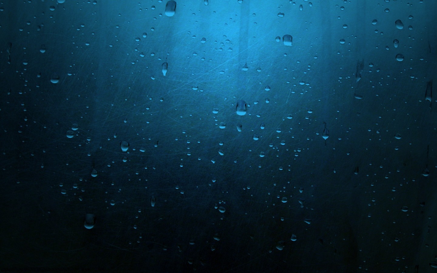 Water droplets on a dark blue textured surface HD Wallpaper